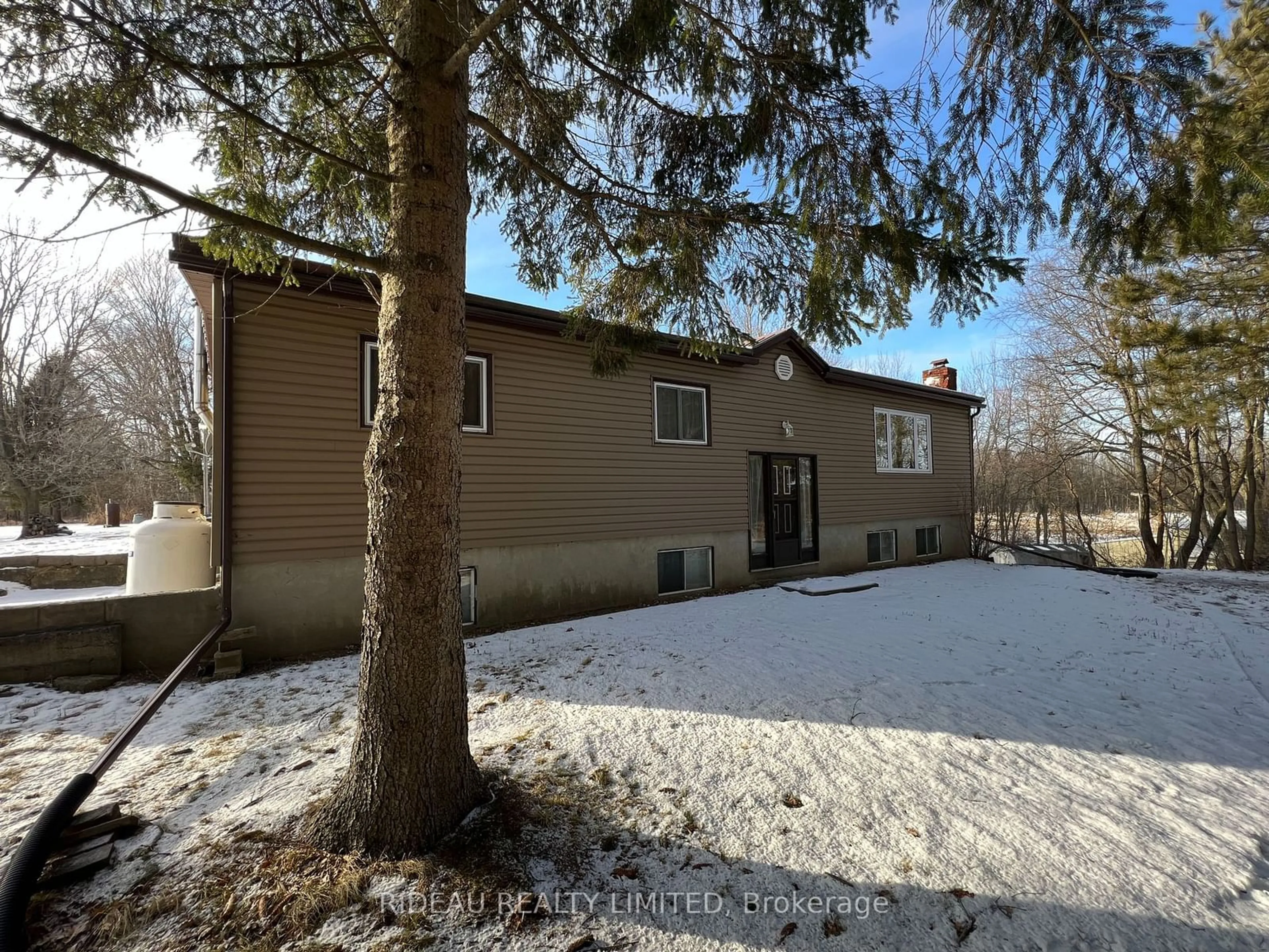 A pic from outside/outdoor area/front of a property/back of a property/a pic from drone, unknown for 3418 Highway 15, Rideau Lakes Ontario K0G 1E0