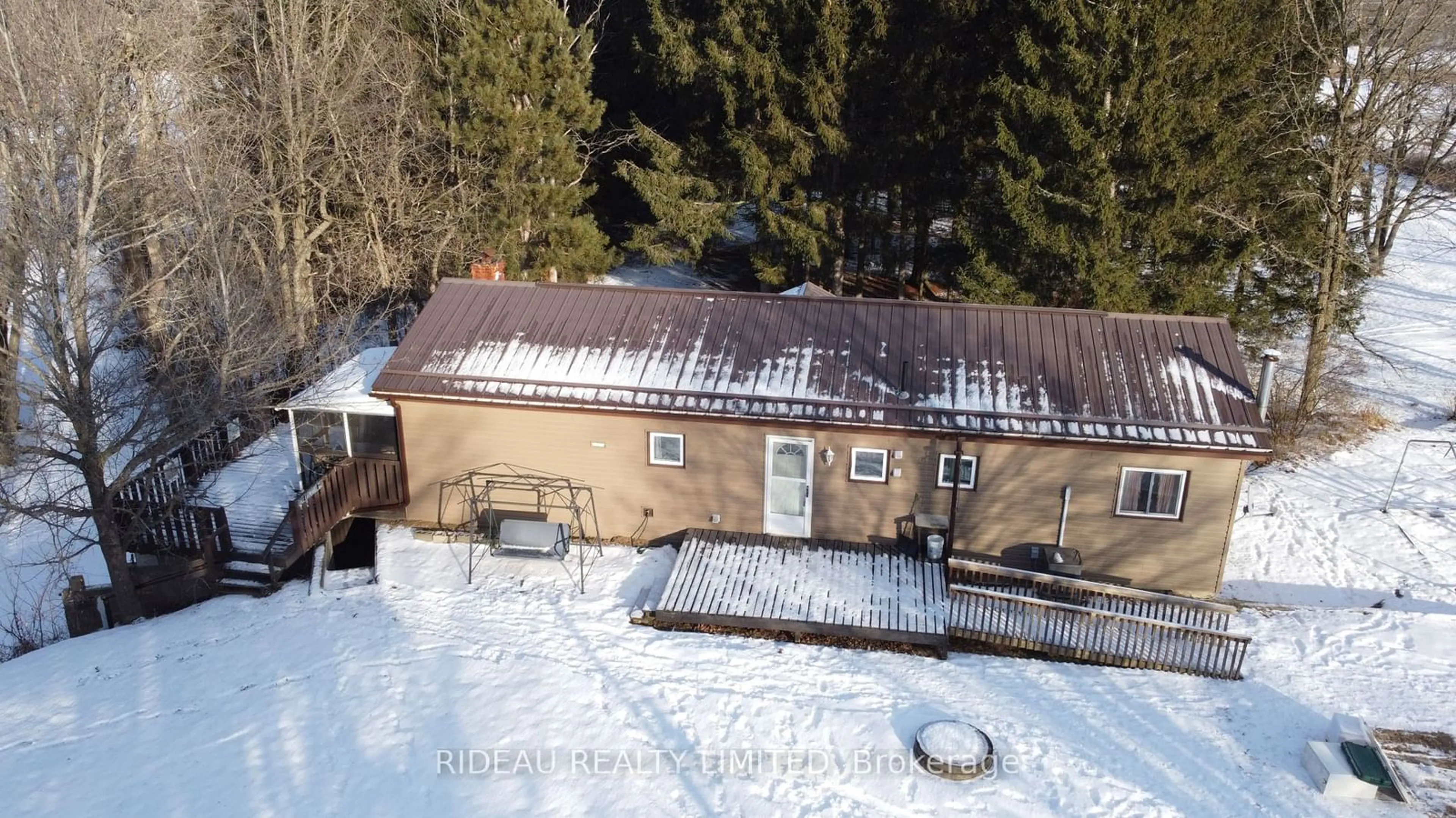 A pic from outside/outdoor area/front of a property/back of a property/a pic from drone, building for 3418 Highway 15, Rideau Lakes Ontario K0G 1E0