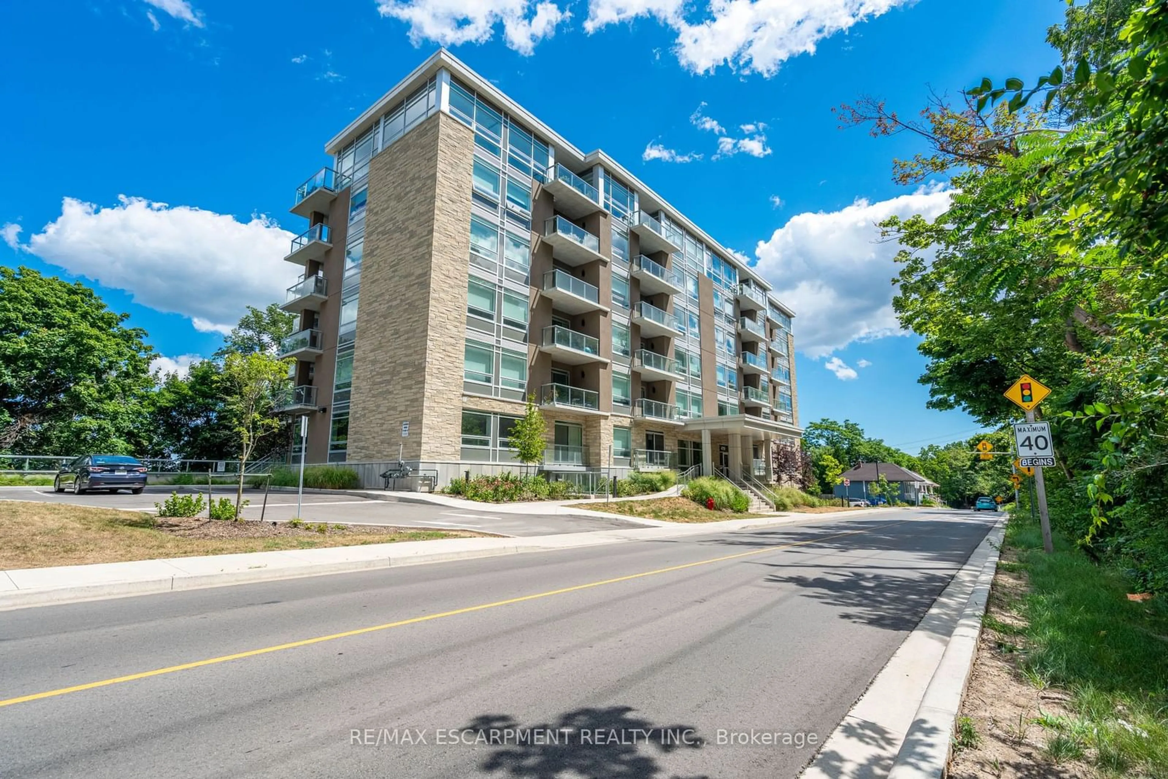 A pic from outside/outdoor area/front of a property/back of a property/a pic from drone, street for 479 Charlton Ave #101, Hamilton Ontario L8N 0B4