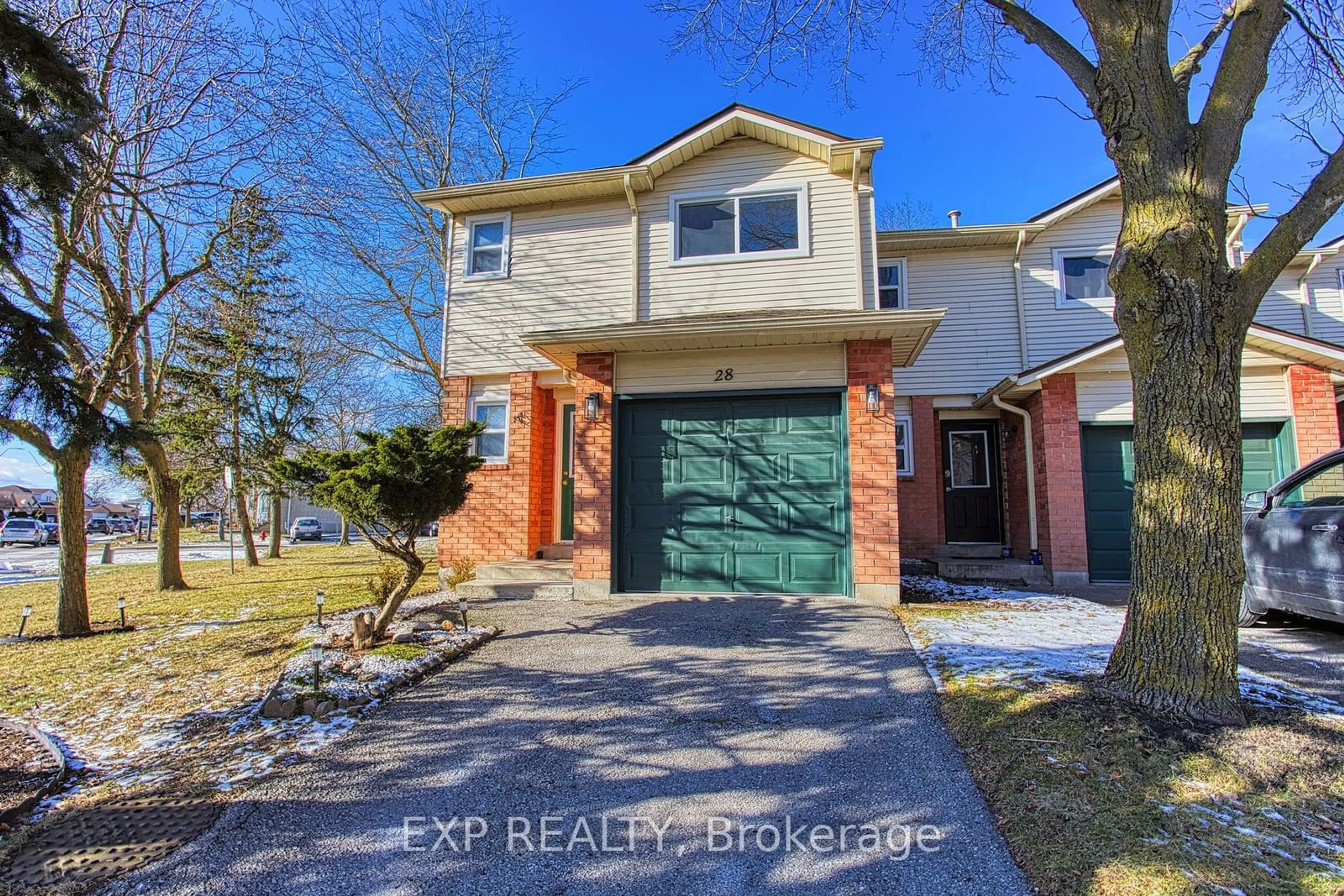 Home with brick exterior material, street for 14 Derby St #28, Hamilton Ontario L8W 3T6