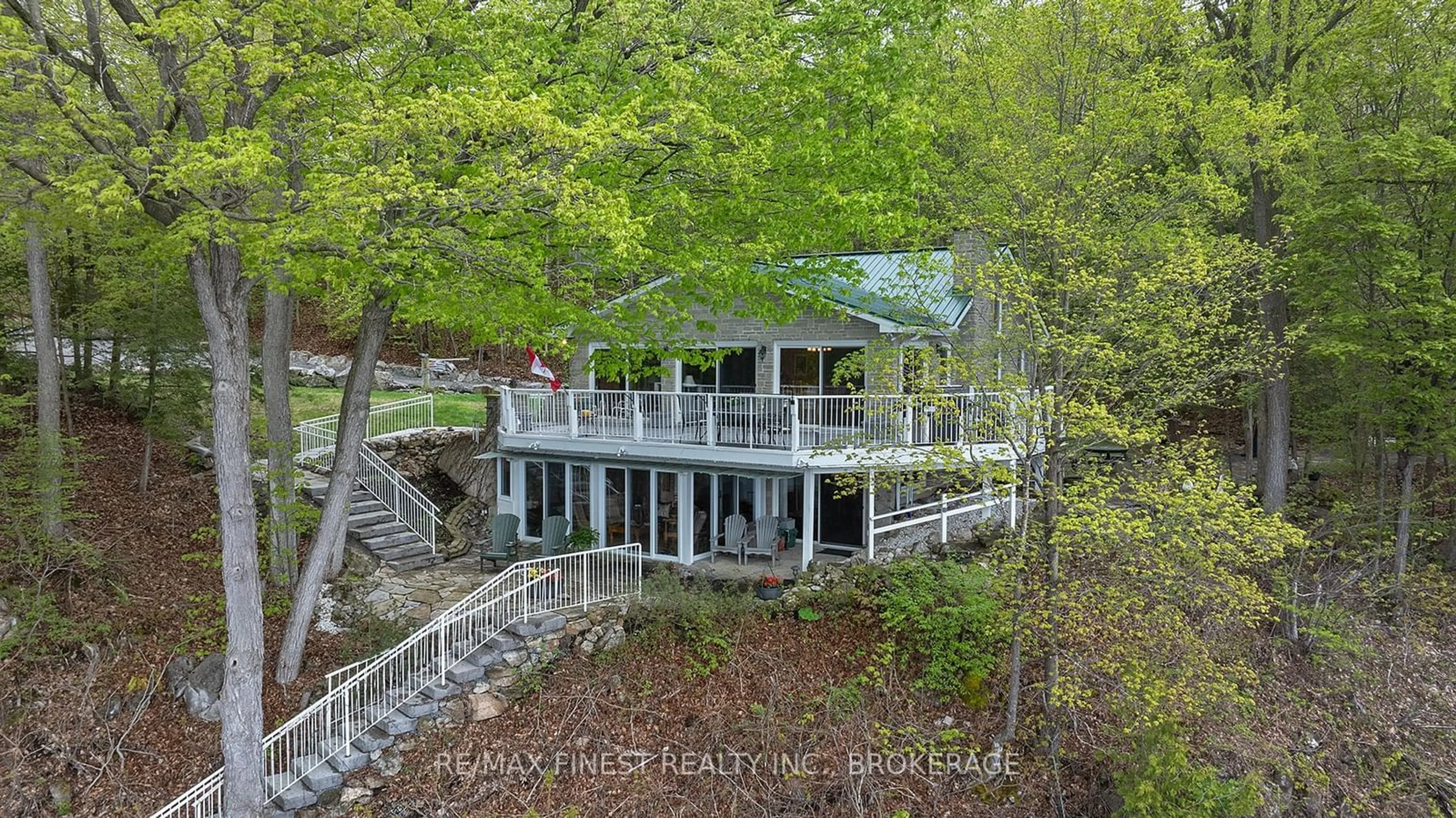 A pic from outside/outdoor area/front of a property/back of a property/a pic from drone, water/lake/river/ocean view for 8126 PERTH Rd, South Frontenac Ontario K0H 2L0