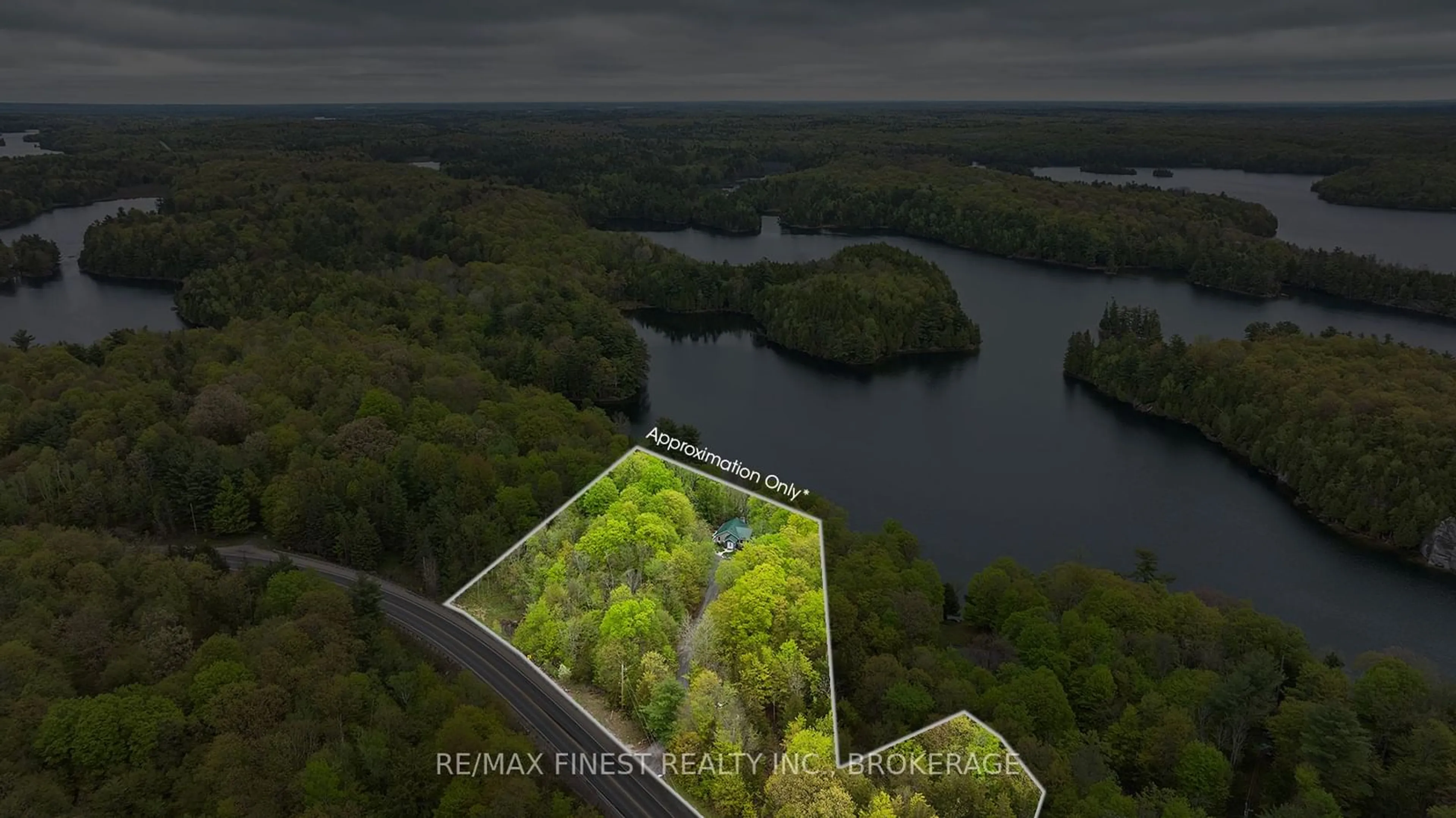 A pic from outside/outdoor area/front of a property/back of a property/a pic from drone, water/lake/river/ocean view for 8126 PERTH Rd, South Frontenac Ontario K0H 2L0