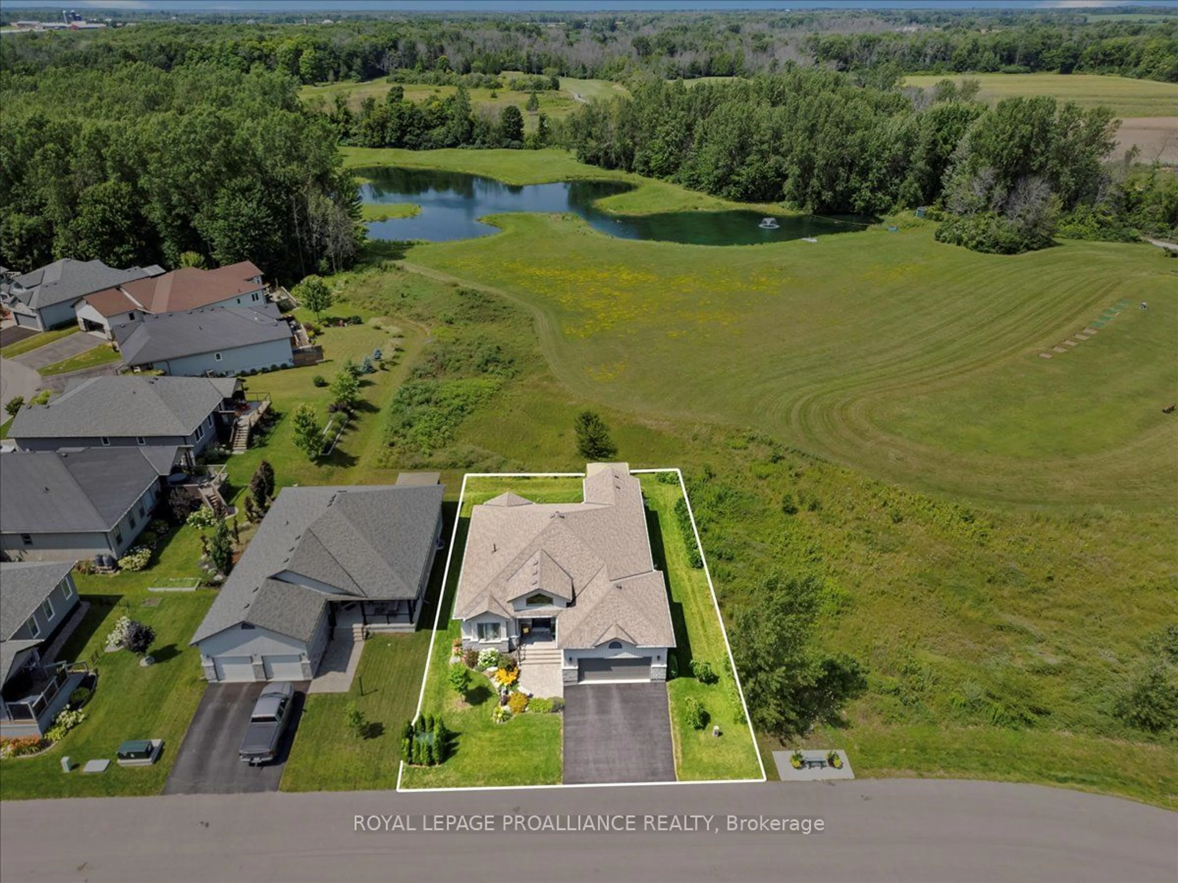 A pic from outside/outdoor area/front of a property/back of a property/a pic from drone, water/lake/river/ocean view for 36 Dorchester Dr, Prince Edward County Ontario K0K 3L0