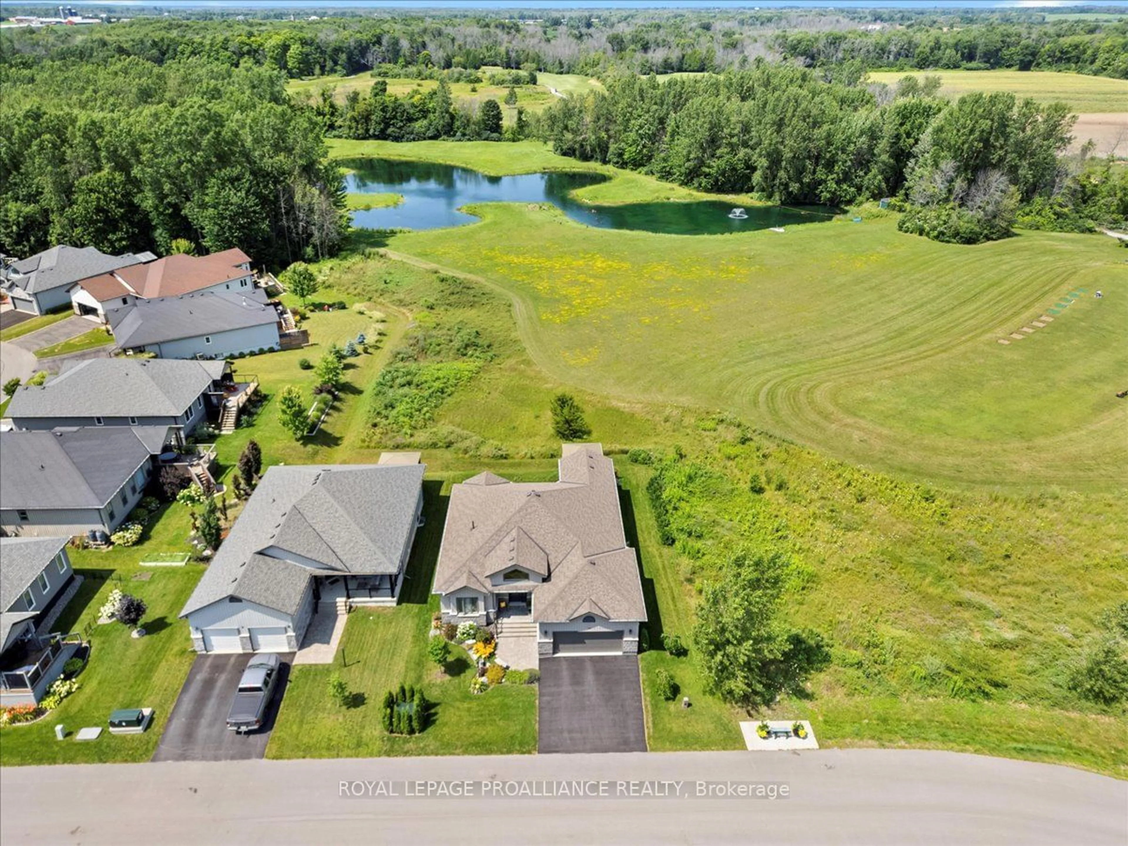 A pic from outside/outdoor area/front of a property/back of a property/a pic from drone, water/lake/river/ocean view for 36 Dorchester Dr, Prince Edward County Ontario K0K 3L0