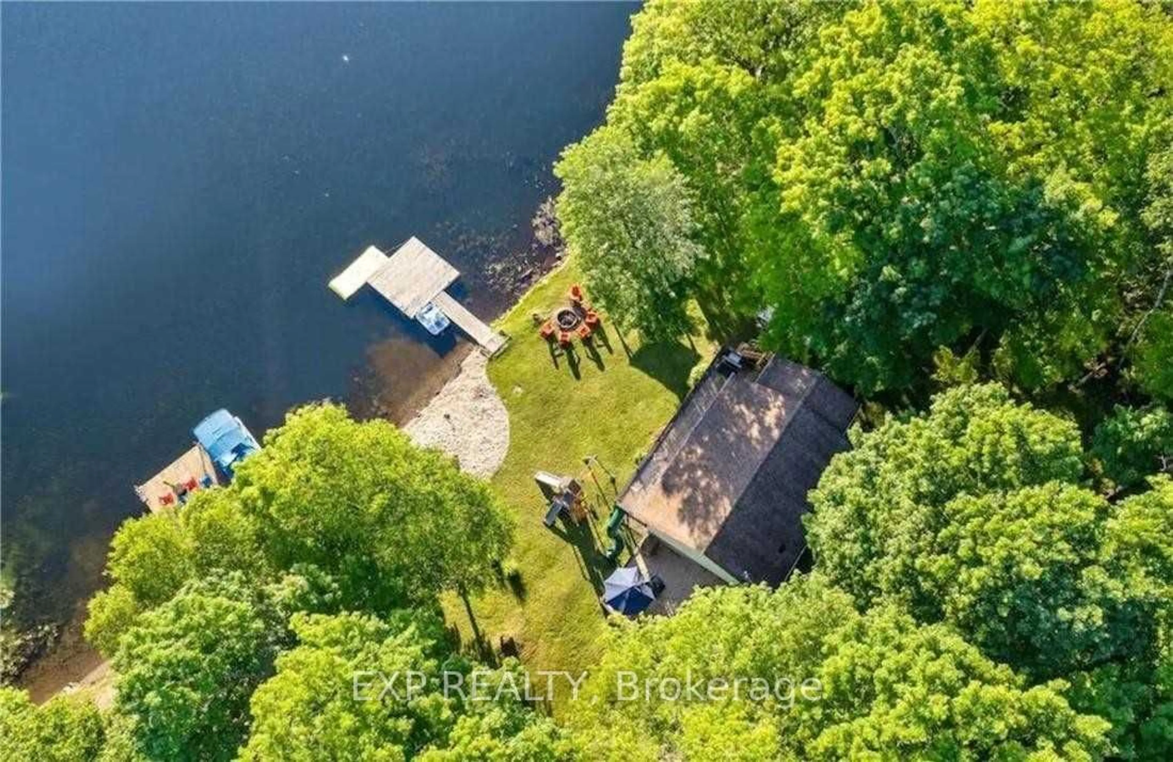 A pic from outside/outdoor area/front of a property/back of a property/a pic from drone, water/lake/river/ocean view for 25 Fire Route 296 Rte, Galway-Cavendish and Harvey Ontario K0L 1J0