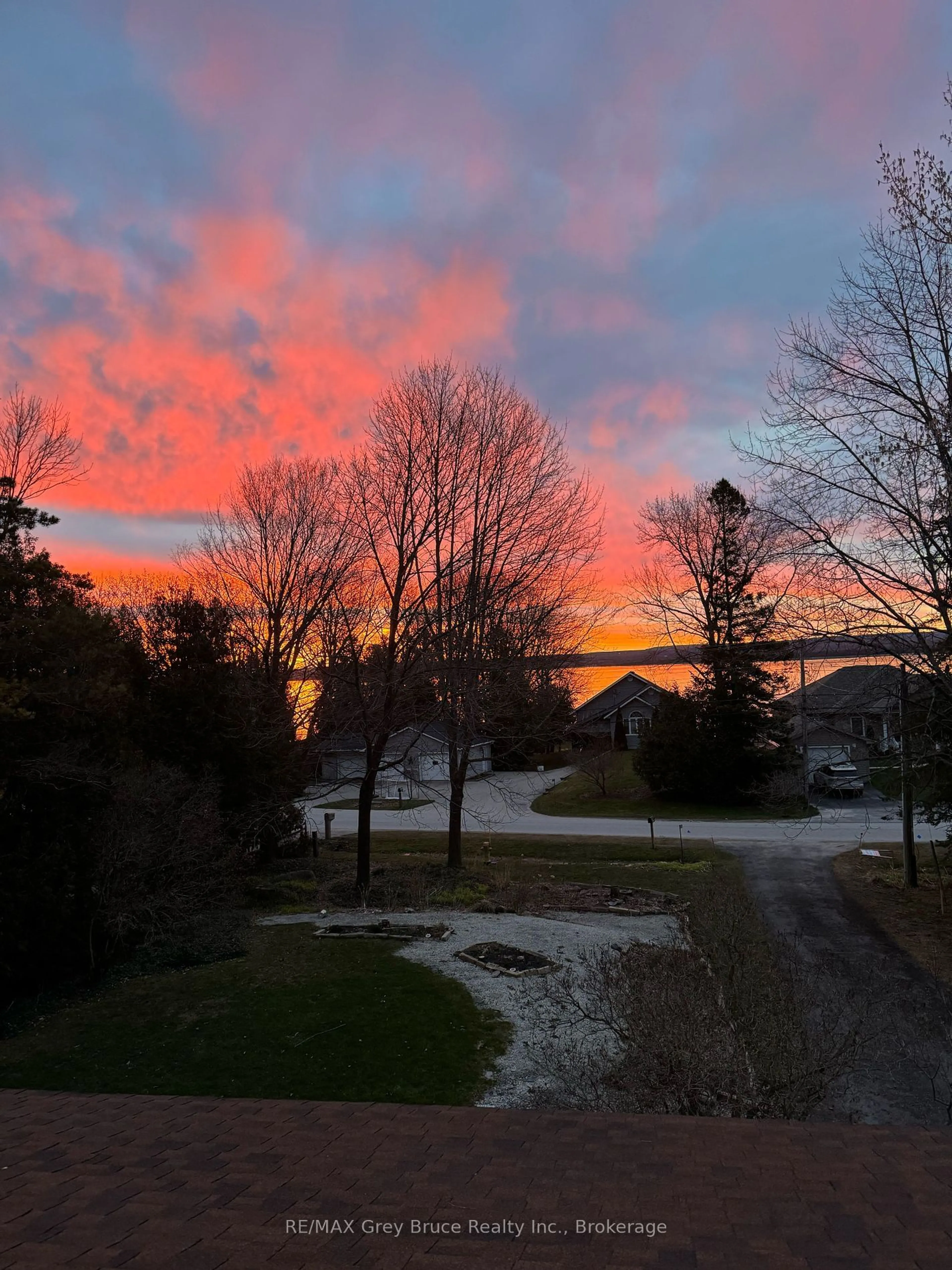 A pic from outside/outdoor area/front of a property/back of a property/a pic from drone, mountain view for 206 Balmy Beach Rd, Georgian Bluffs Ontario N4K 5N4