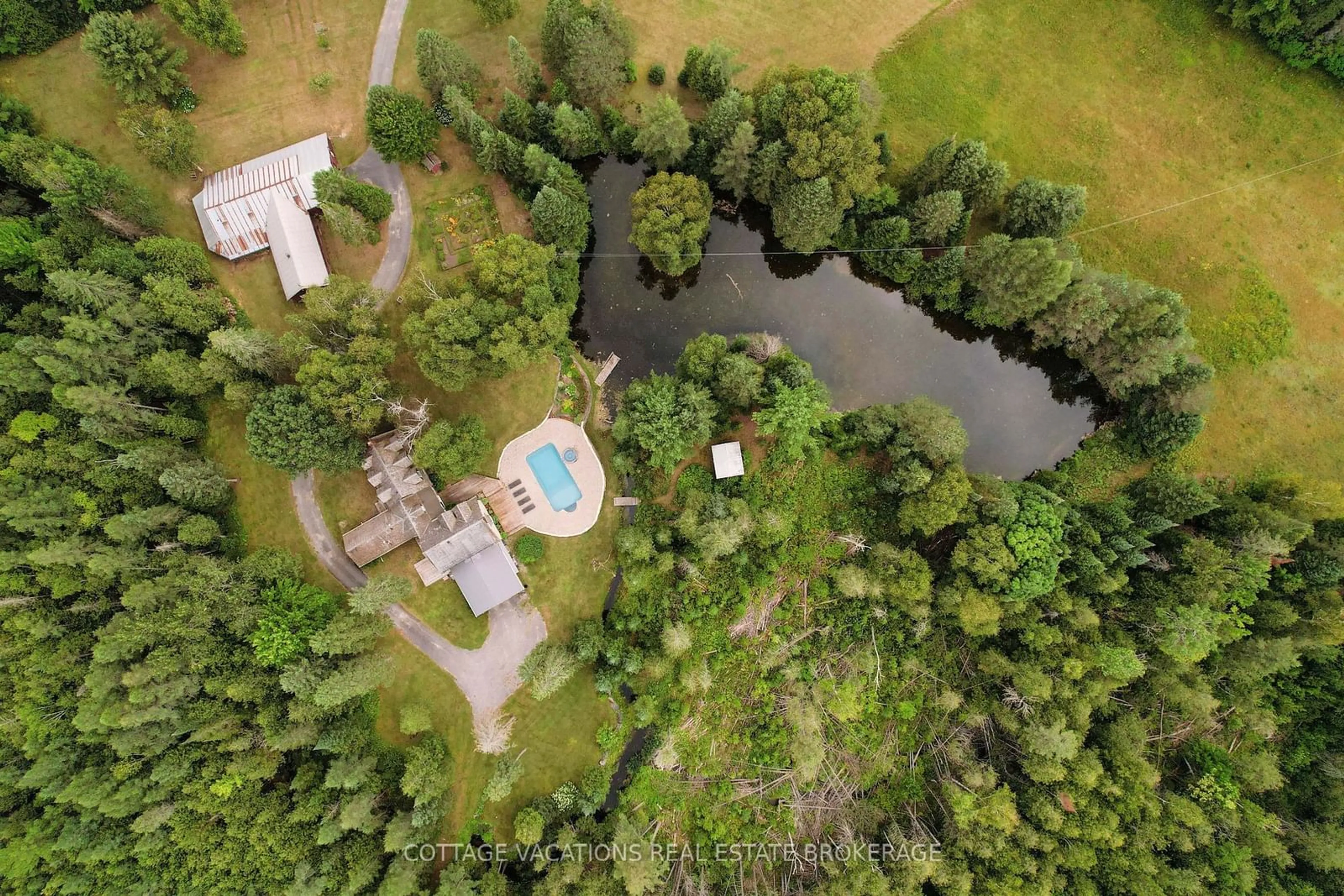 A pic from outside/outdoor area/front of a property/back of a property/a pic from drone, water/lake/river/ocean view for 2090 County 121 Rd, Kawartha Lakes Ontario K0M 1C0