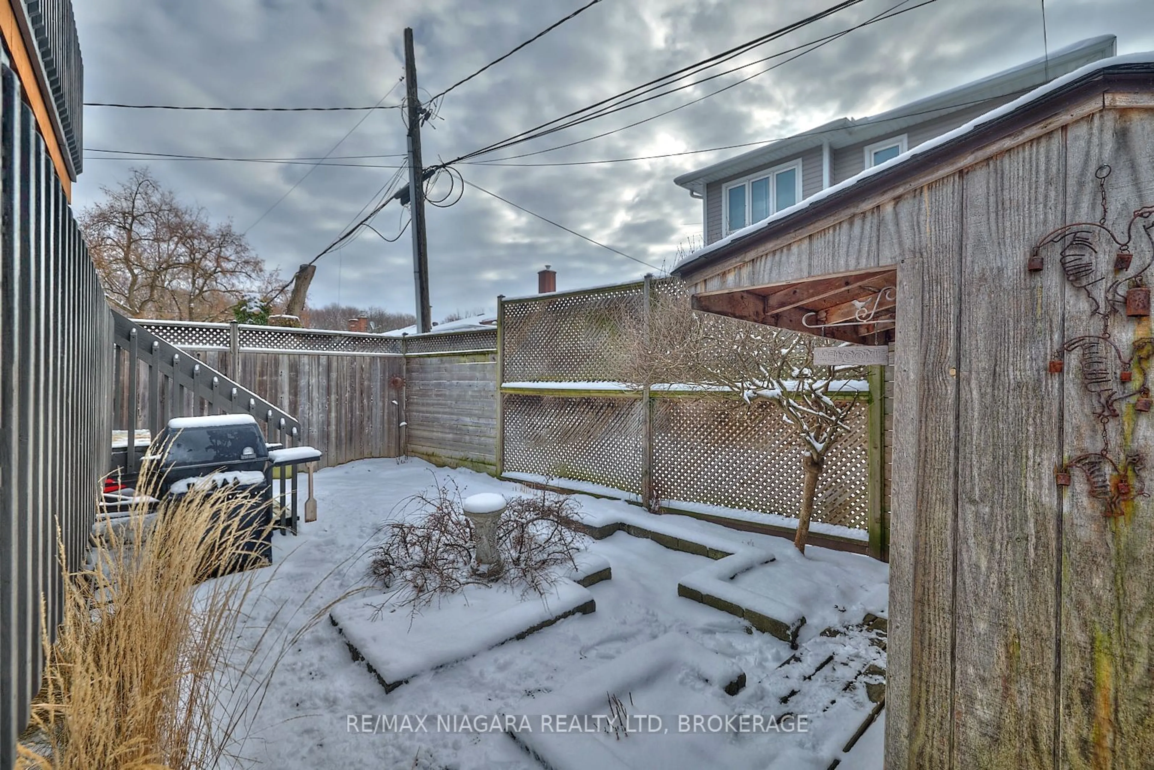 A pic from outside/outdoor area/front of a property/back of a property/a pic from drone, street for 12 1/2 Lombardy Ave, St. Catharines Ontario L2M 1A2