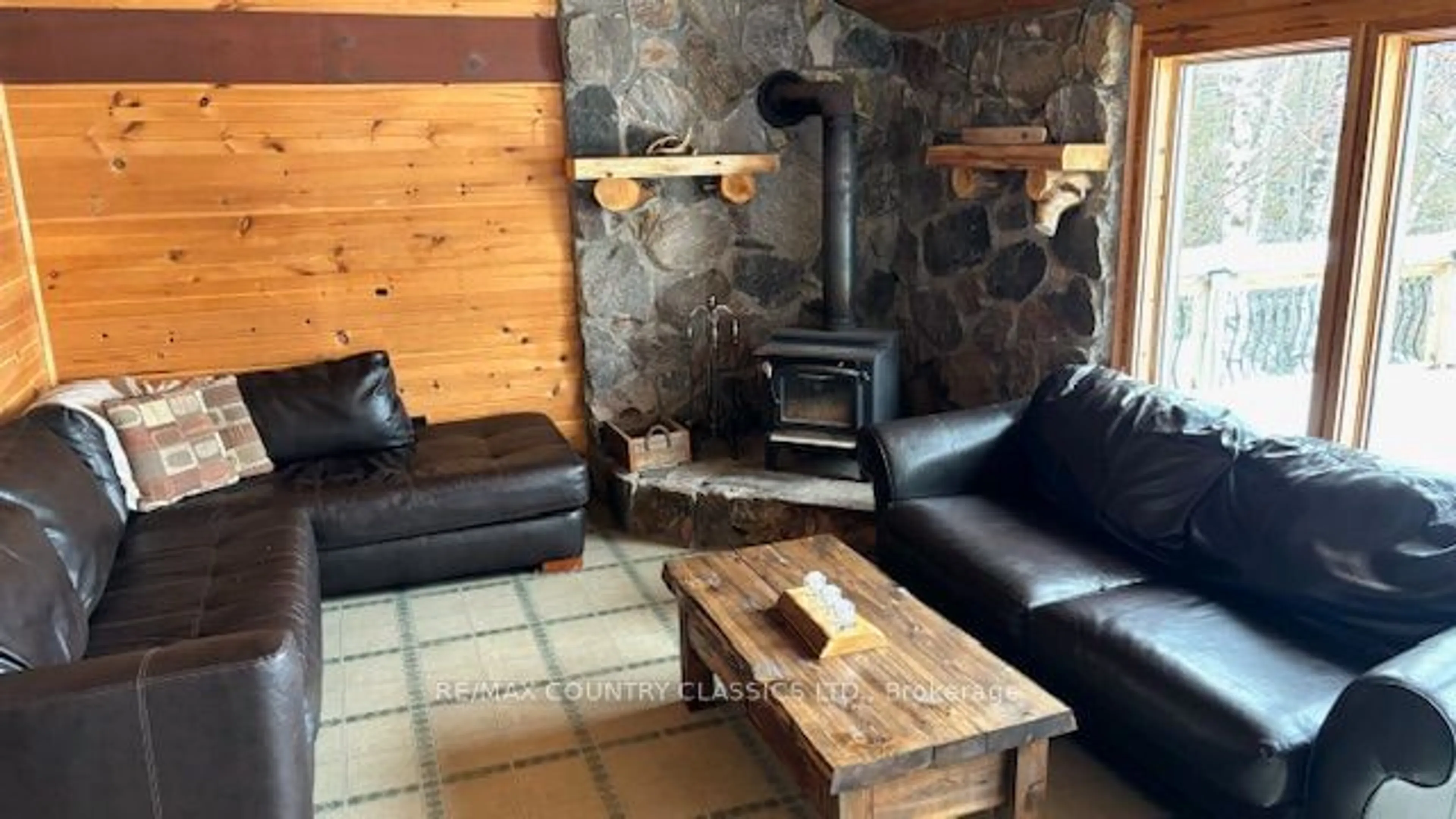 Living room with furniture, unknown for 431 Bowers Point Rd, Hastings Highlands Ontario K0L 1C0