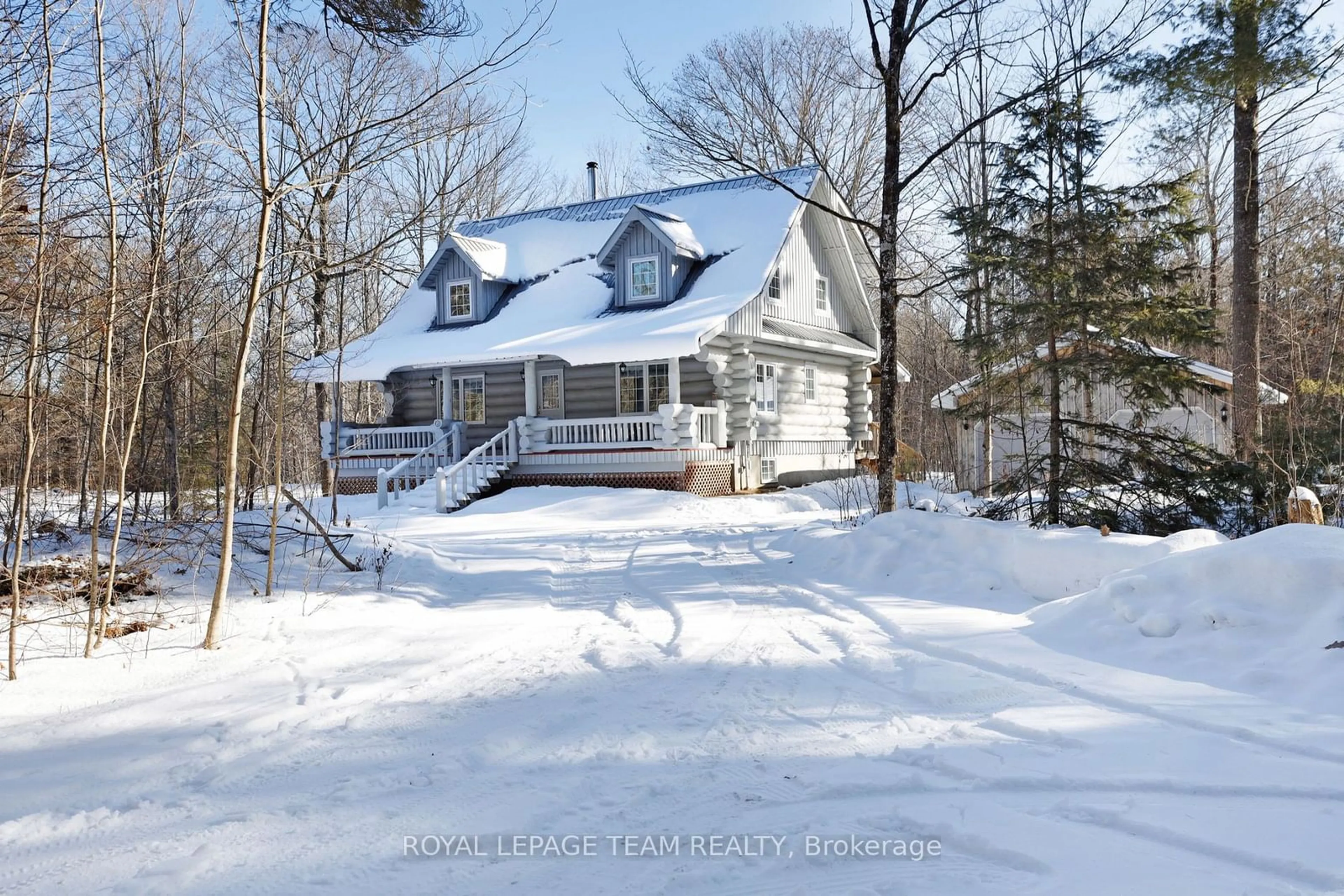 A pic from outside/outdoor area/front of a property/back of a property/a pic from drone, street for 4583 Tatlock Rd, Lanark Highlands Ontario K0A 1P0