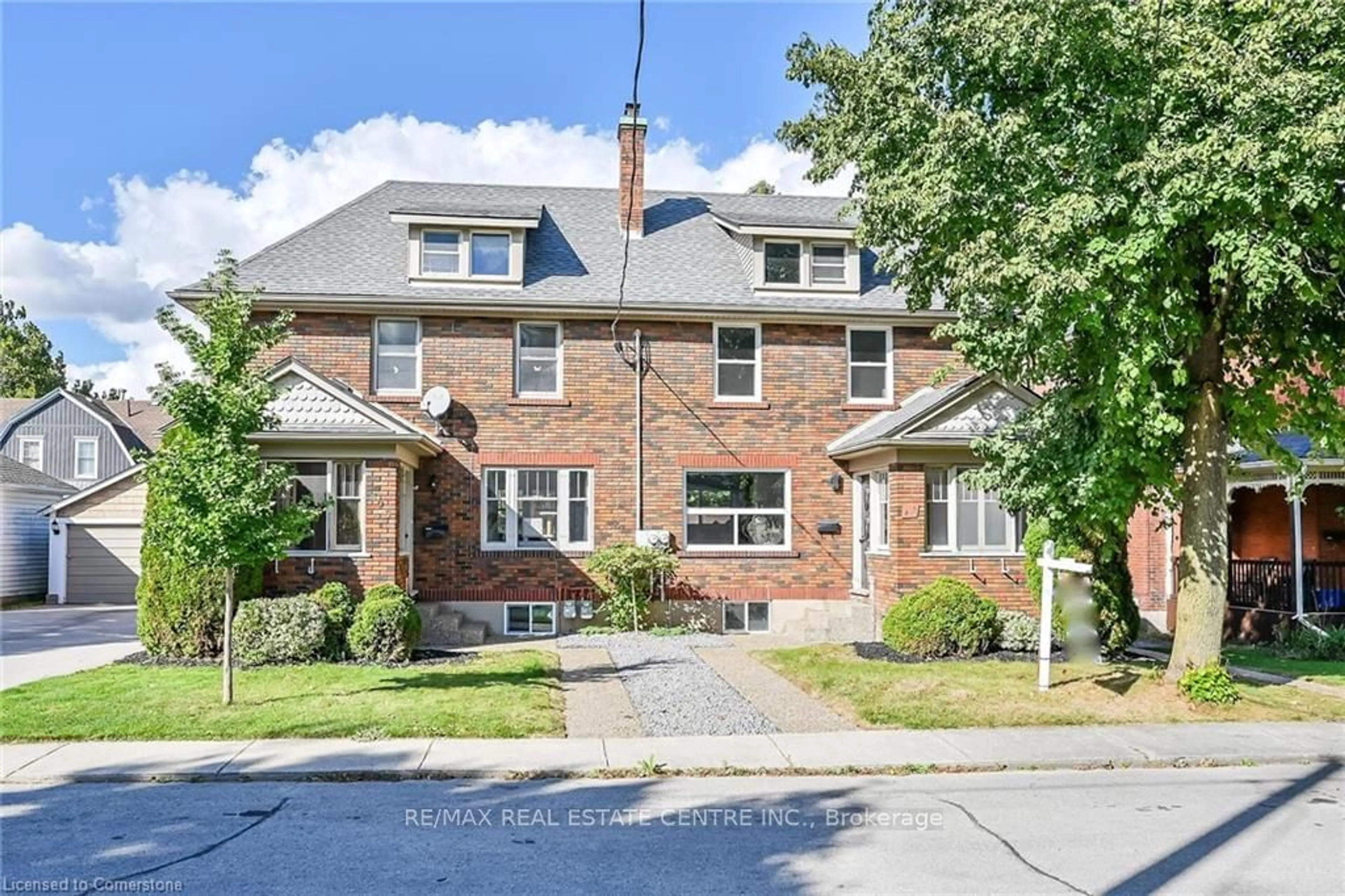 Home with brick exterior material, street for 495-497 Mary St, Woodstock Ontario N4S 4S6