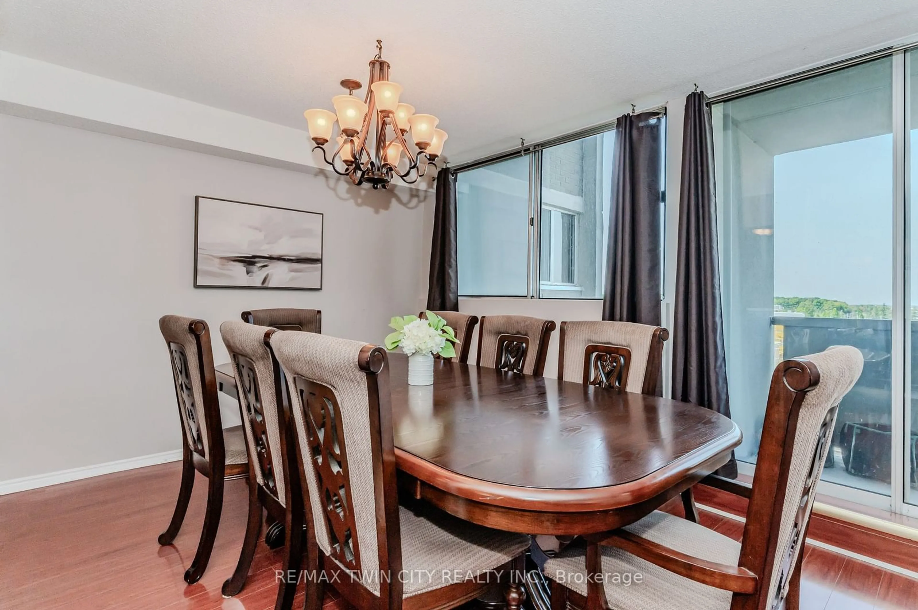 Dining room, wood/laminate floor for 375 King St #707, Waterloo Ontario N2J 4L6