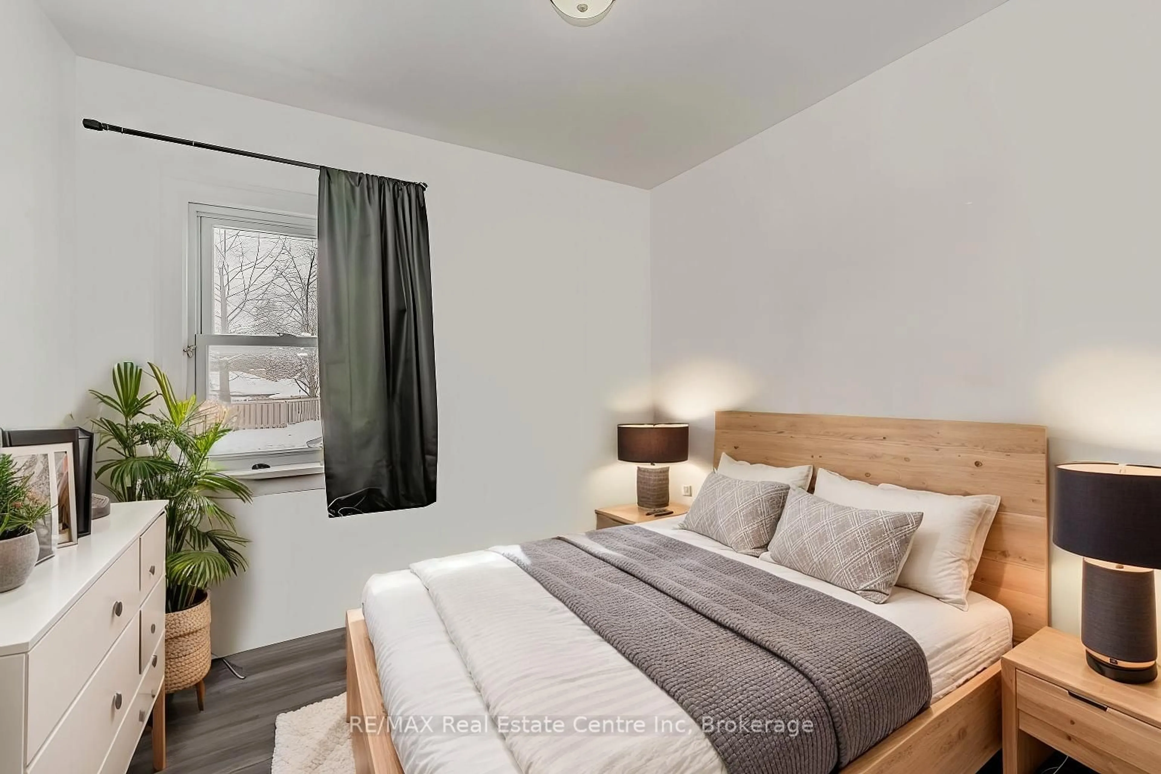 Bedroom with bed, wood/laminate floor for 48 Alma St, Guelph Ontario N1H 5W7