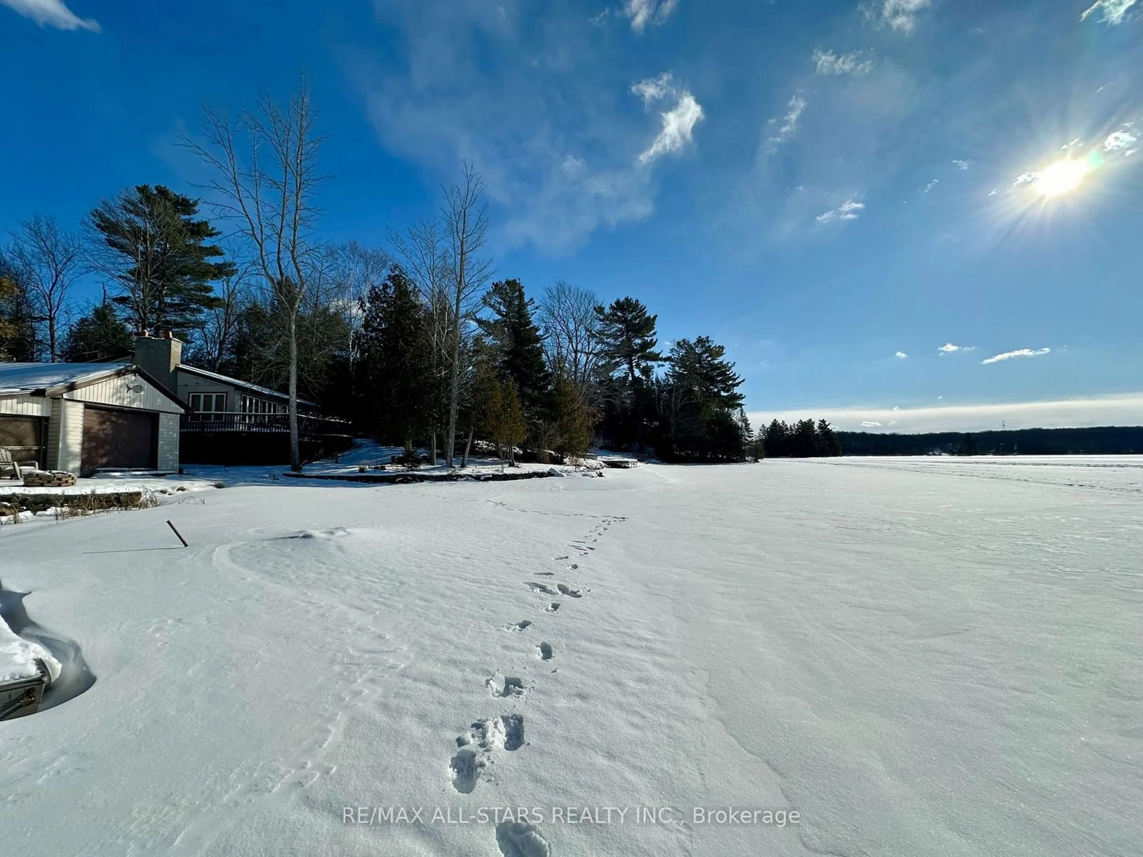 A pic from outside/outdoor area/front of a property/back of a property/a pic from drone, water/lake/river/ocean view for 68 Sunset Crt, Galway-Cavendish and Harvey Ontario K0M 1A0