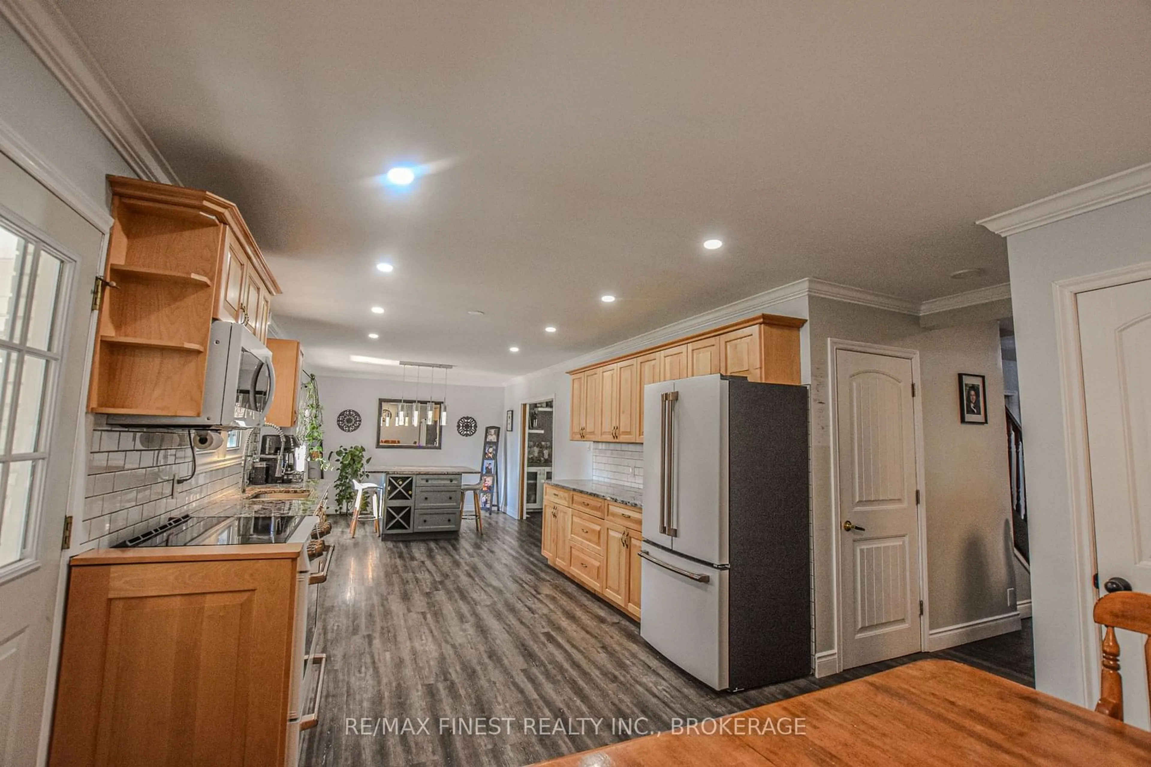 Open concept kitchen, wood/laminate floor for 1084 COUNTY ROAD 6, Loyalist Ontario K0H 2H0