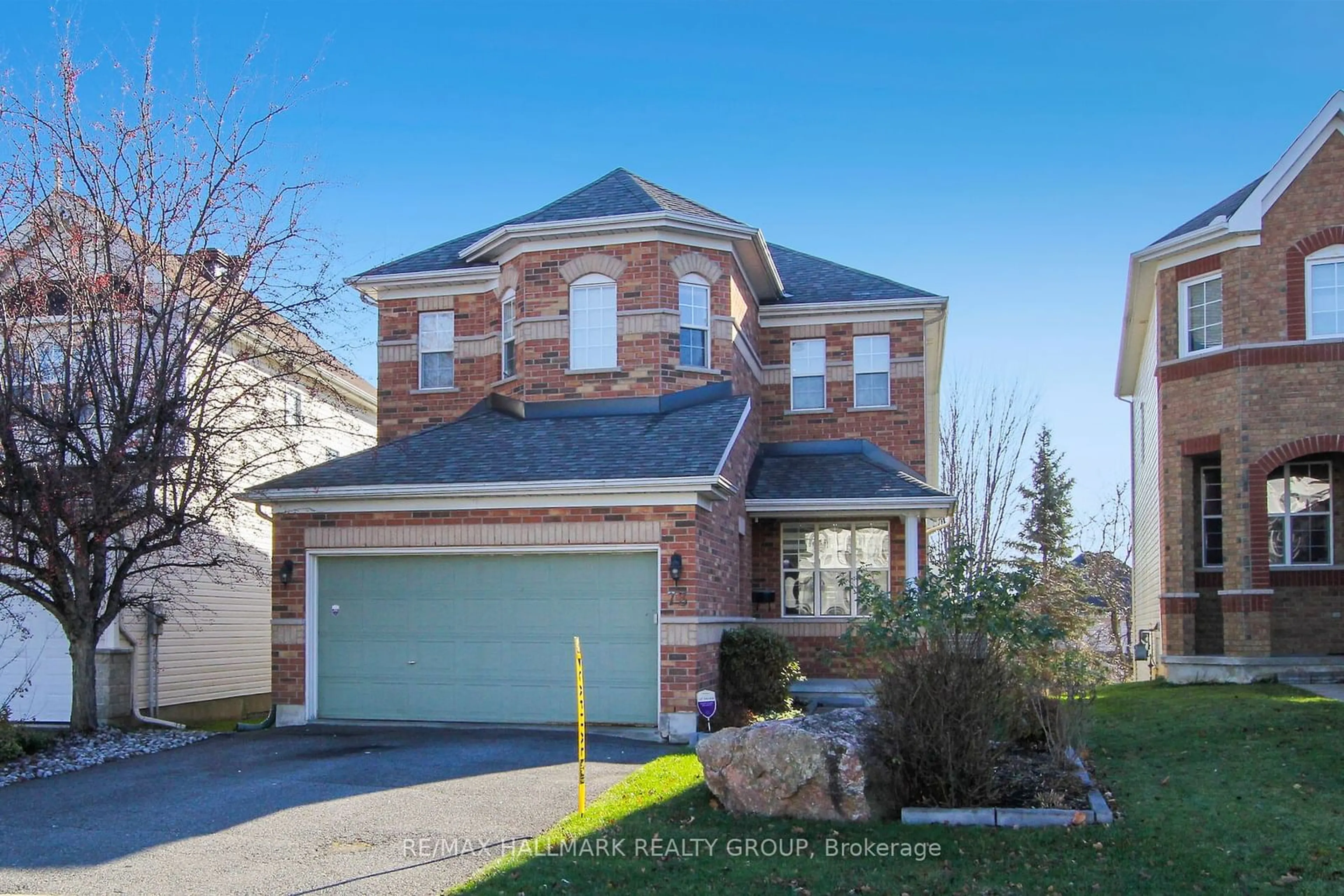 Home with brick exterior material, street for 73 Goldridge Dr, Kanata Ontario K2T 1E9