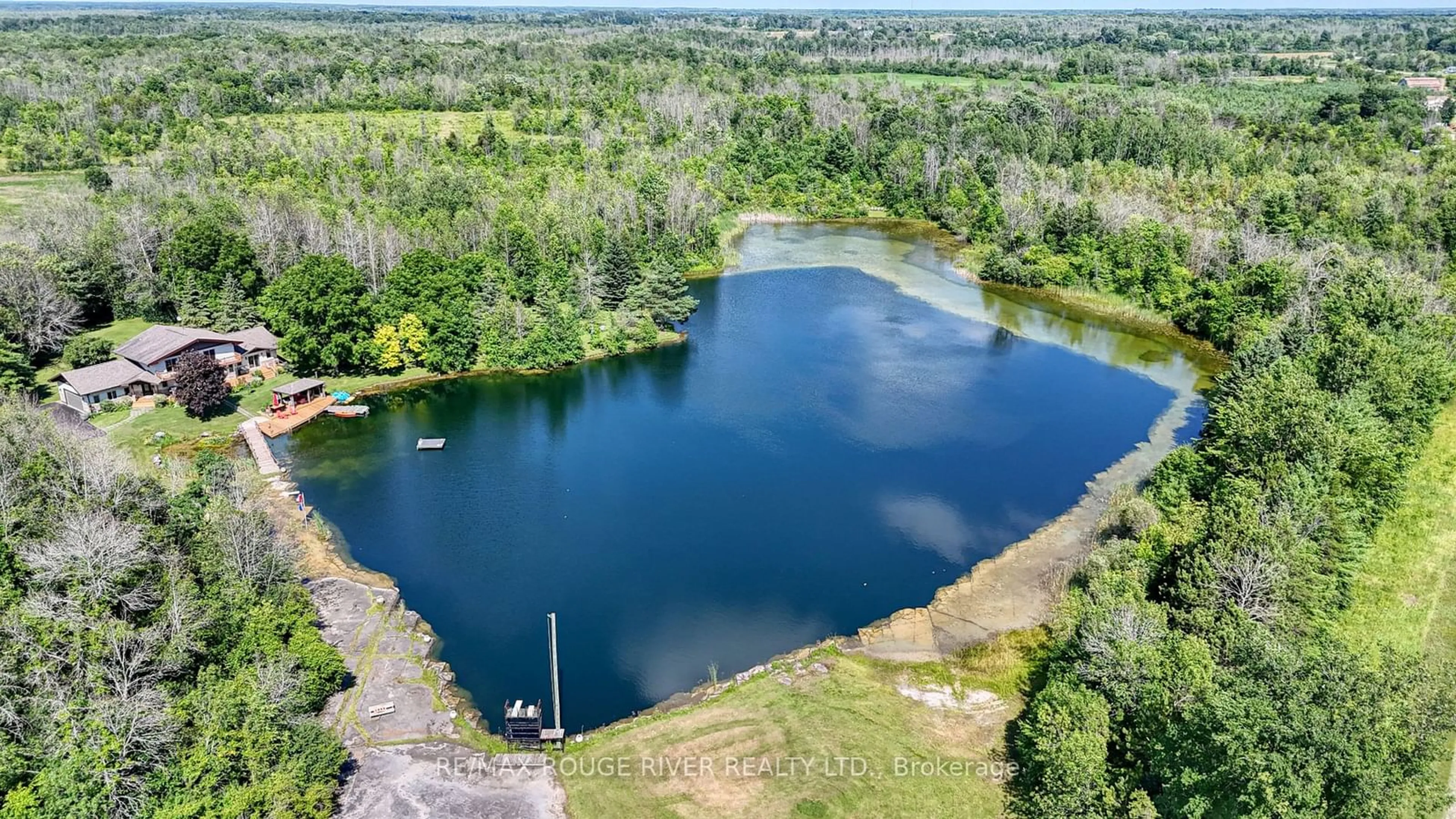 A pic from outside/outdoor area/front of a property/back of a property/a pic from drone, water/lake/river/ocean view for 908 County Rd 42 Rd, Athens Ontario K0E 1B0