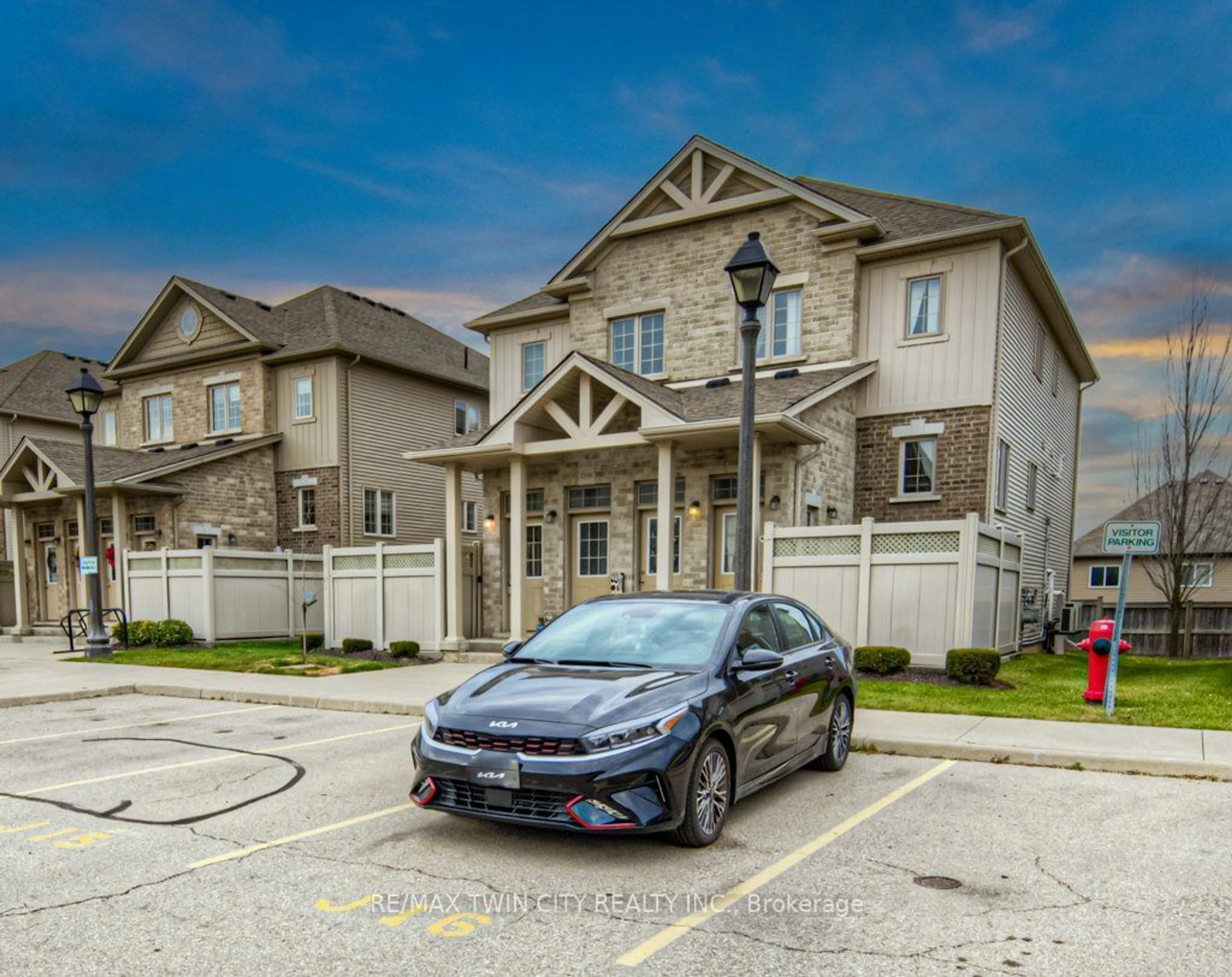 A pic from outside/outdoor area/front of a property/back of a property/a pic from drone, street for 228 Jessica Cres #A, Kitchener Ontario N2R 0C5