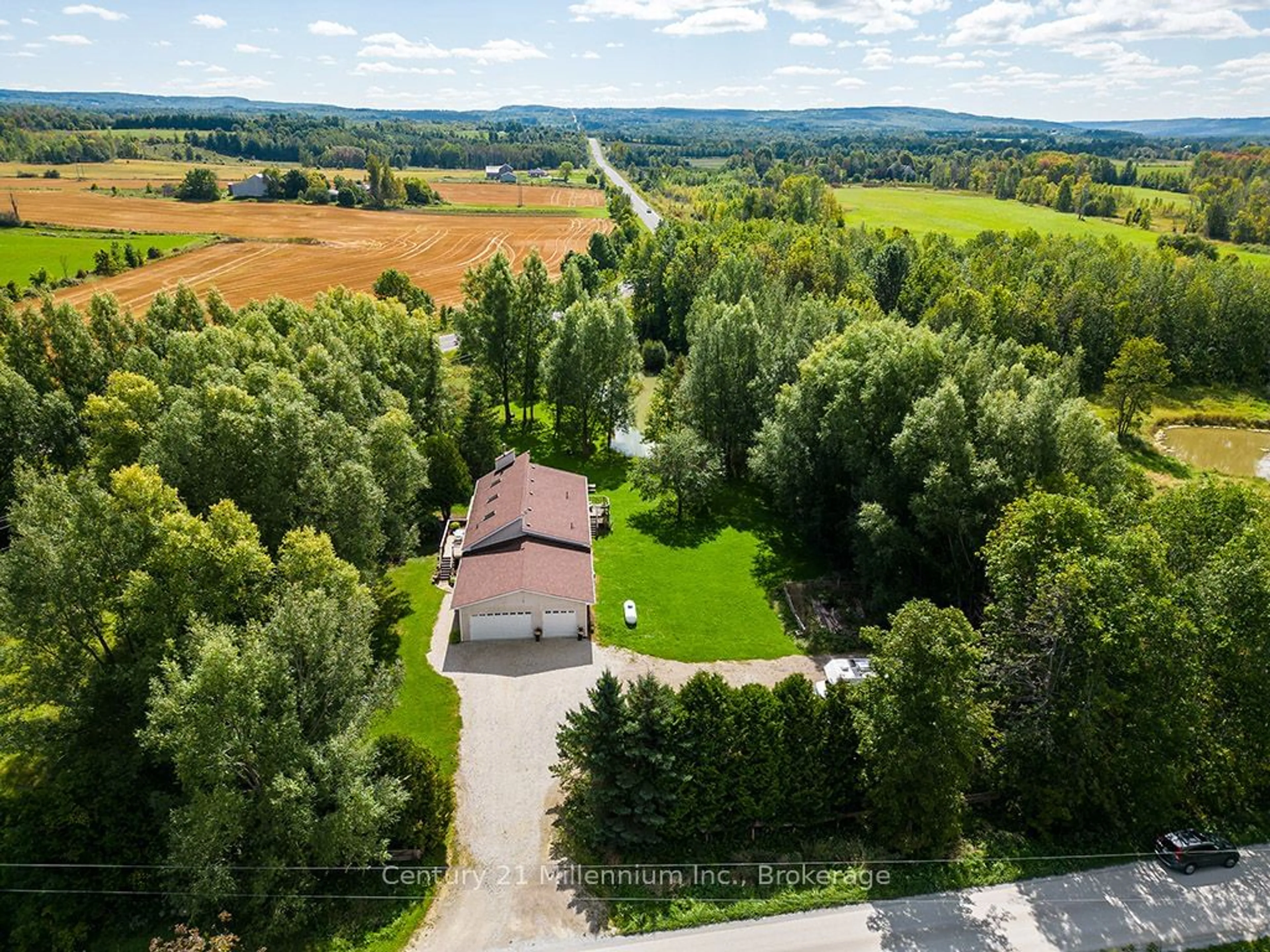 A pic from outside/outdoor area/front of a property/back of a property/a pic from drone, forest/trees view for 727302 22C Sdrd, Blue Mountains Ontario N0H 1N0