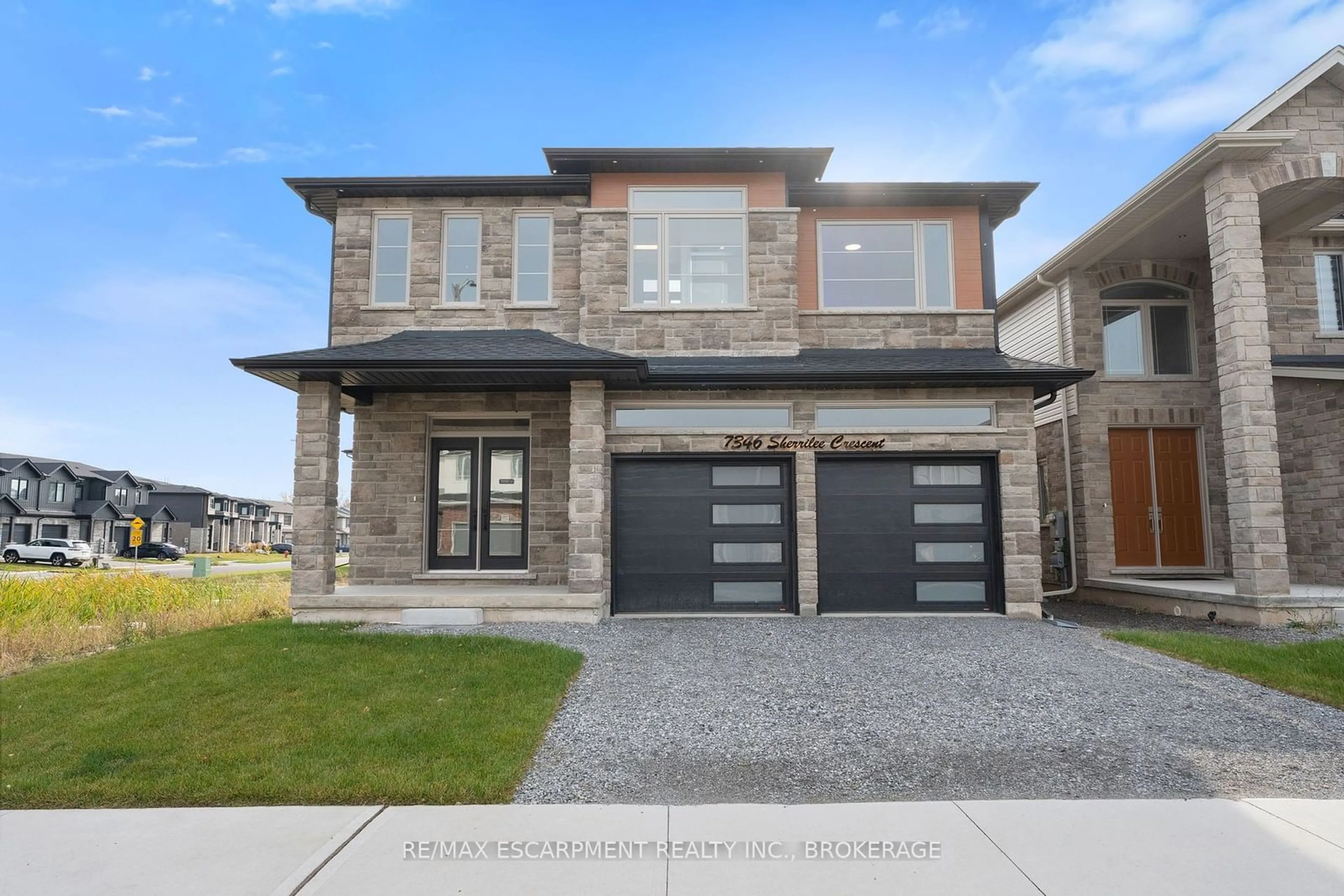 Home with brick exterior material, street for 7346 Sherrilee Cres, Niagara Falls Ontario L2H 2Y6