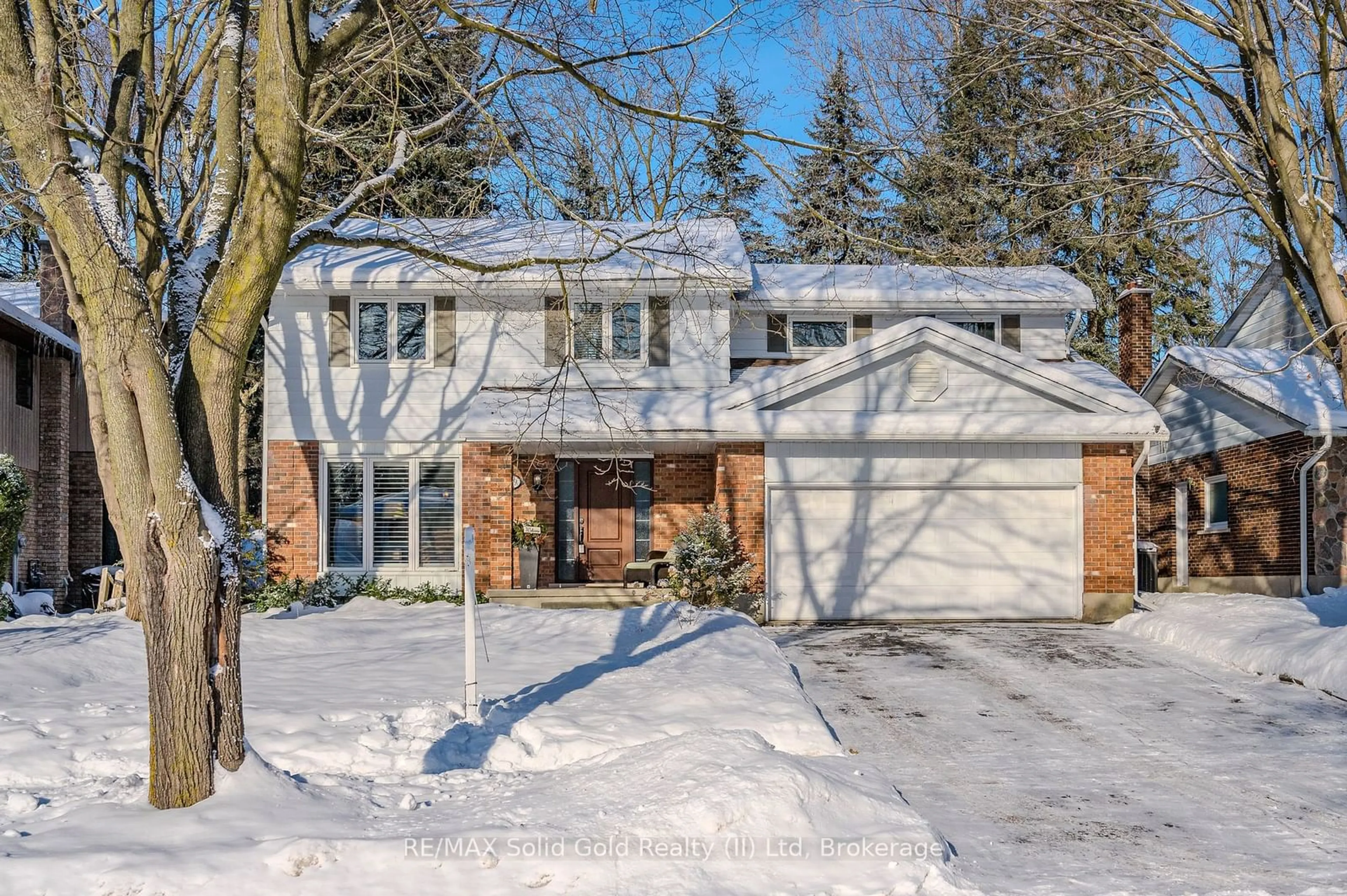 Home with brick exterior material, street for 299 Craigleith Dr, Waterloo Ontario N2L 5B4