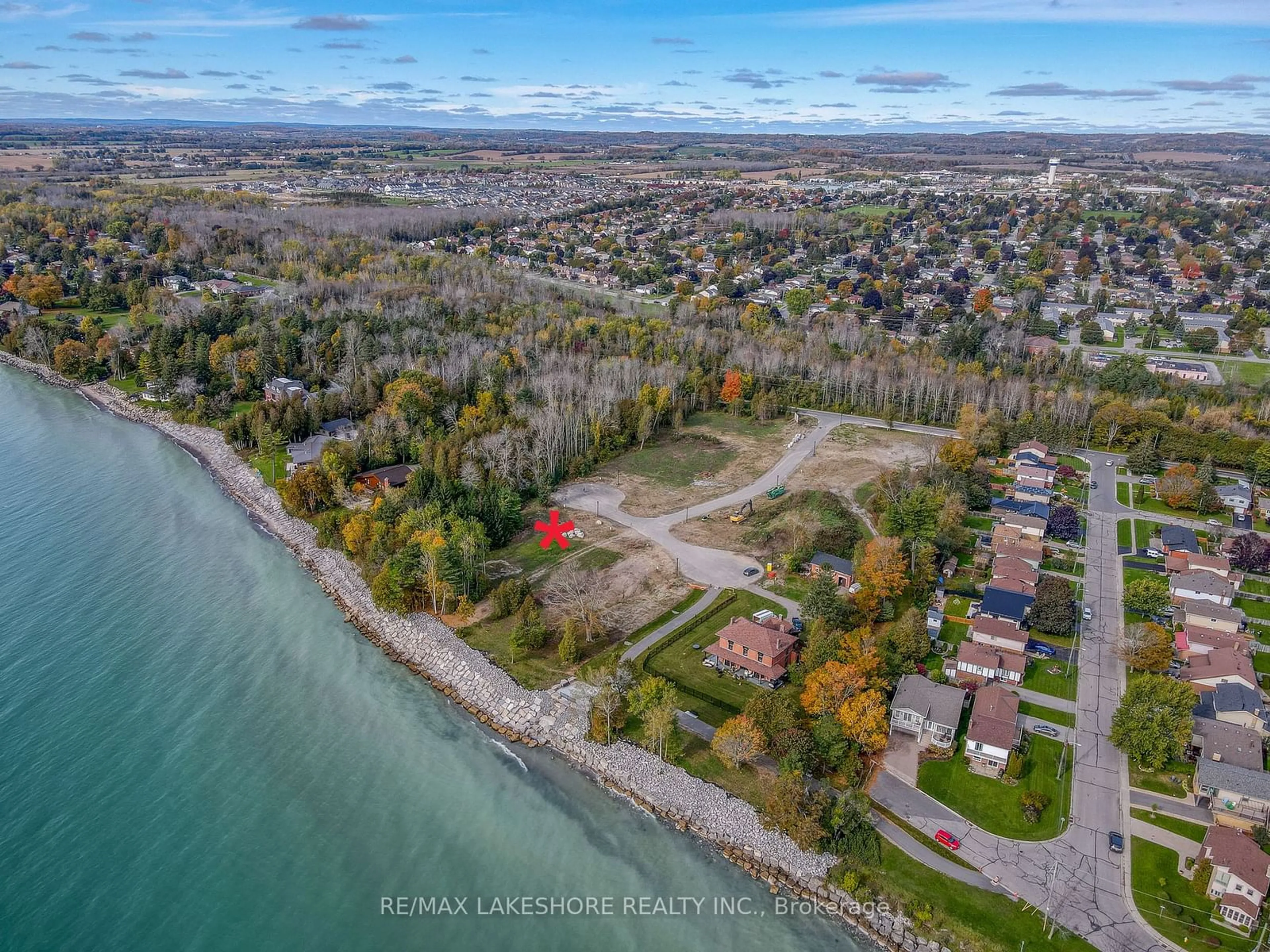 A pic from outside/outdoor area/front of a property/back of a property/a pic from drone, water/lake/river/ocean view for 619 CEDAR SHORE Tr, Cobourg Ontario K9A 3L3