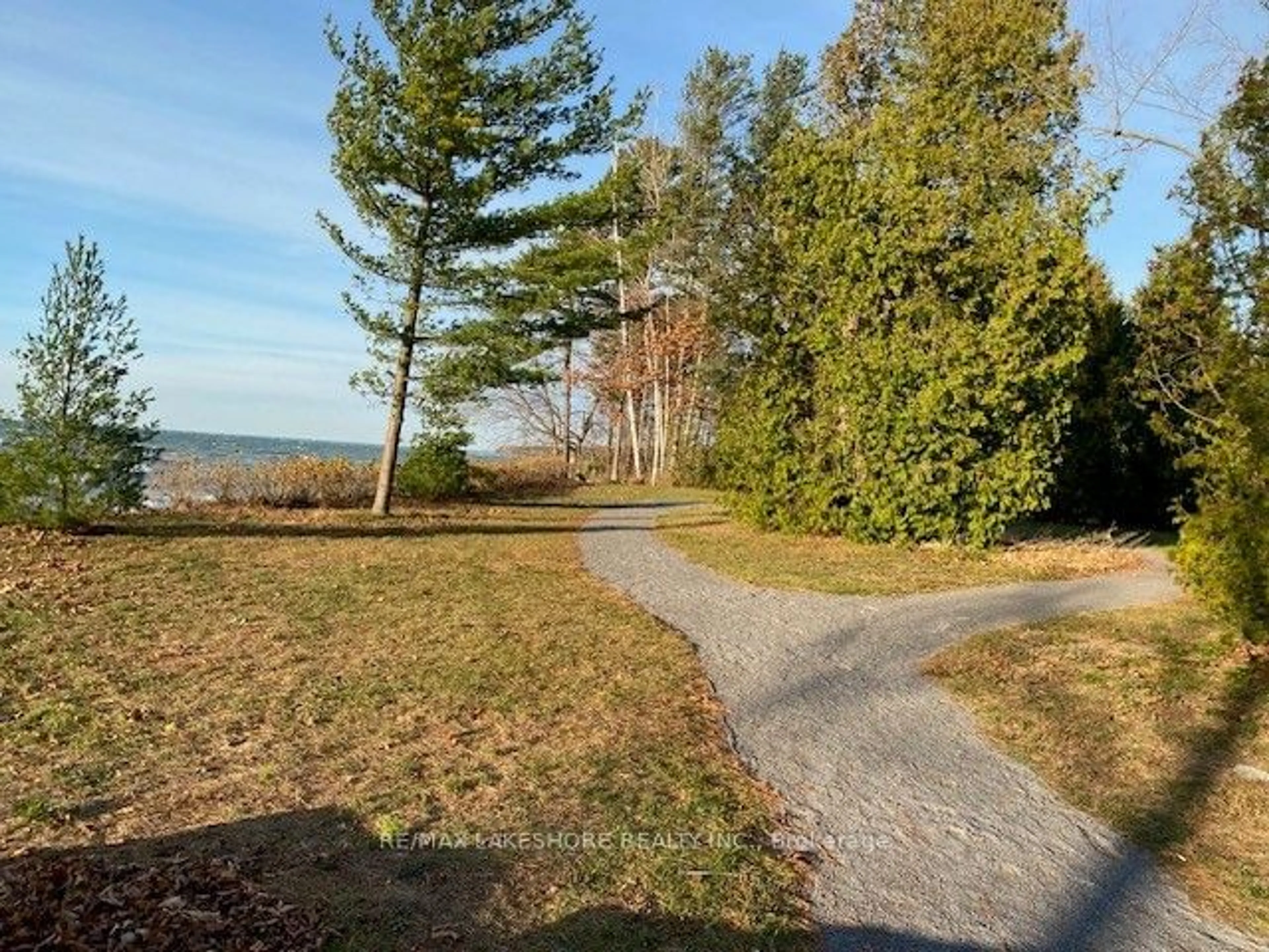 A pic from outside/outdoor area/front of a property/back of a property/a pic from drone, forest/trees view for 619 CEDAR SHORE Tr, Cobourg Ontario K9A 3L3