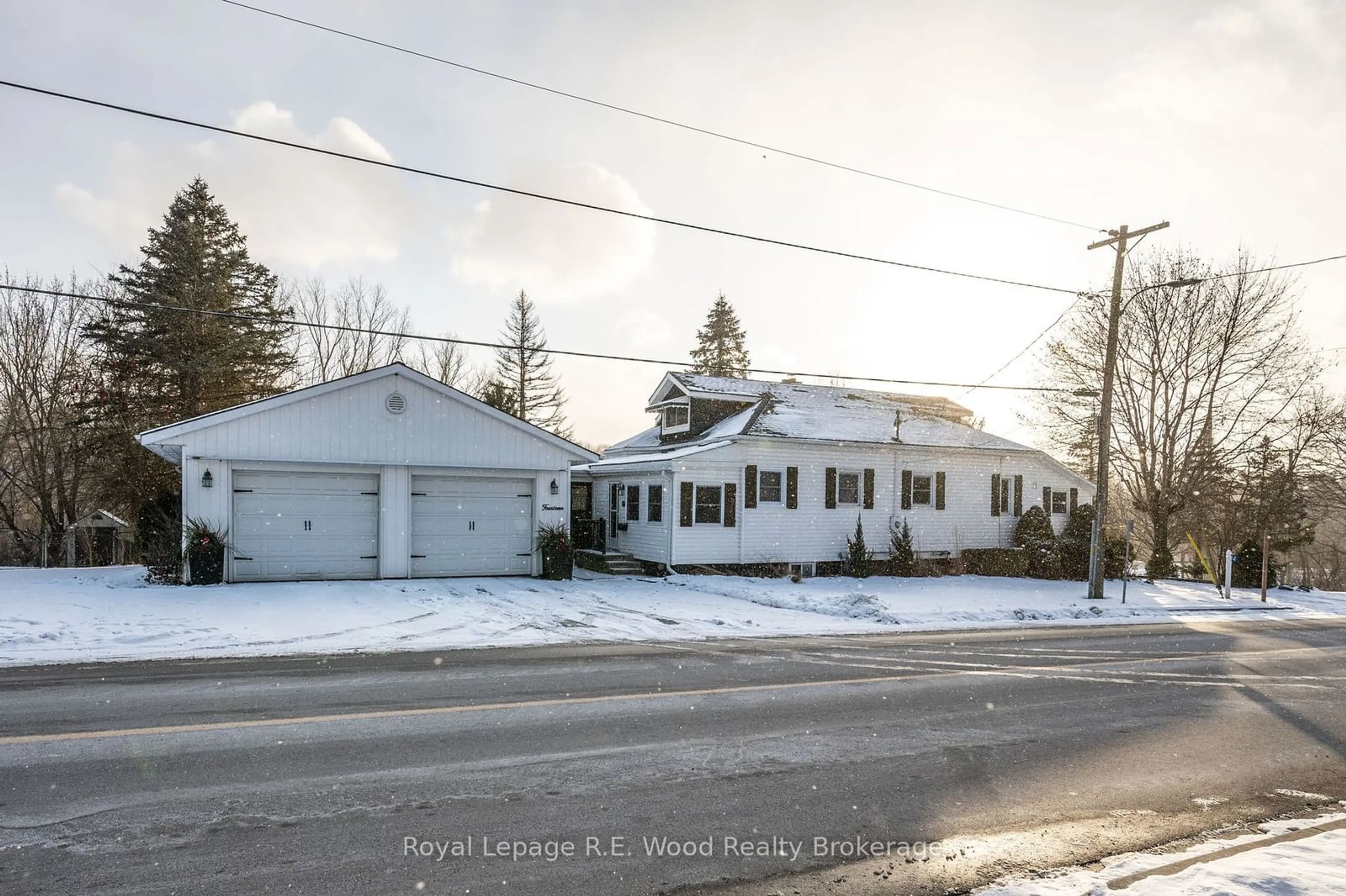 Home with vinyl exterior material, street for 14 Woodland Rd, Central Elgin Ontario N5P 1P2
