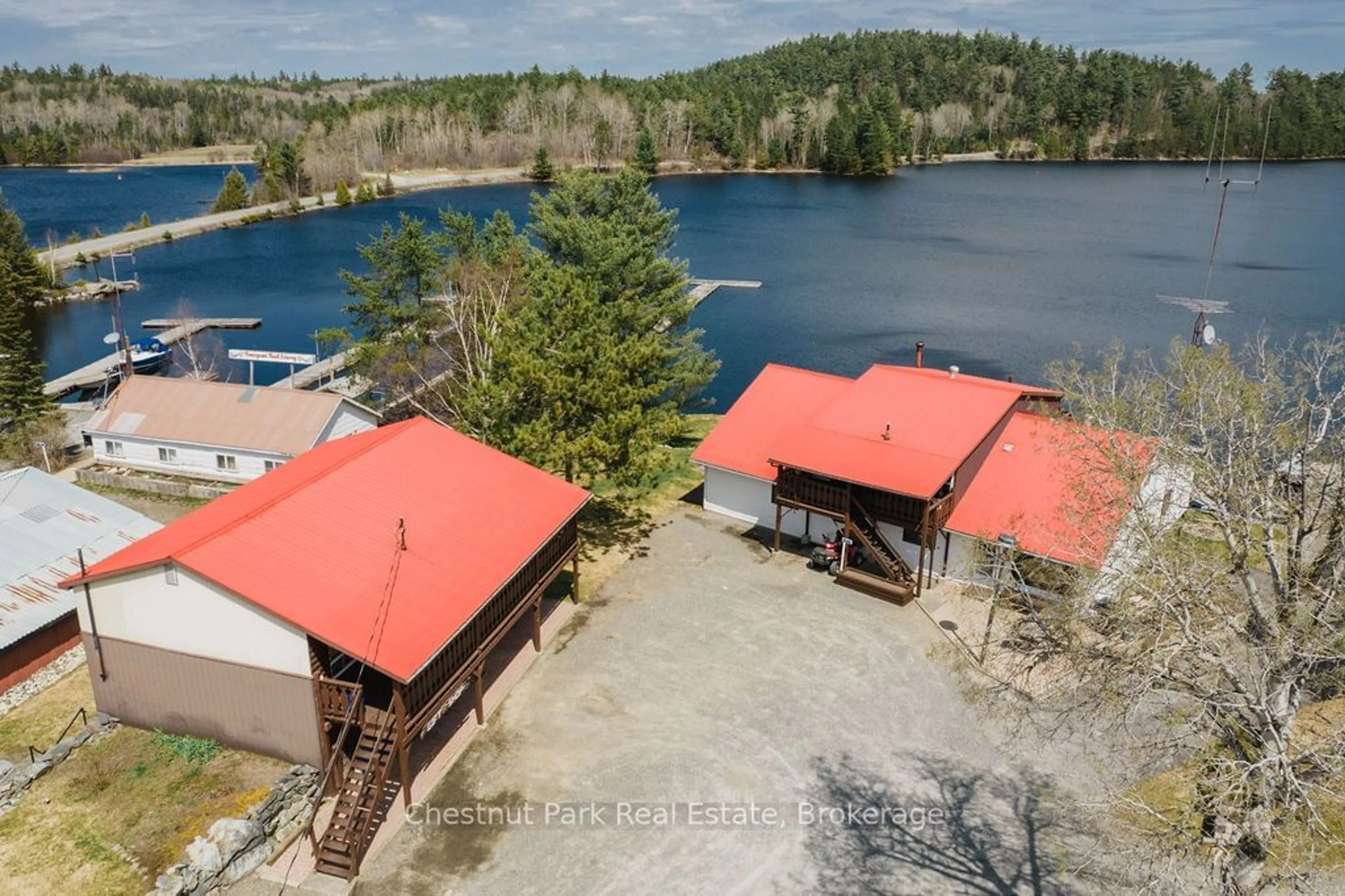 A pic from outside/outdoor area/front of a property/back of a property/a pic from drone, water/lake/river/ocean view for 51 STEVENS Rd, Temagami Ontario P0H 2H0