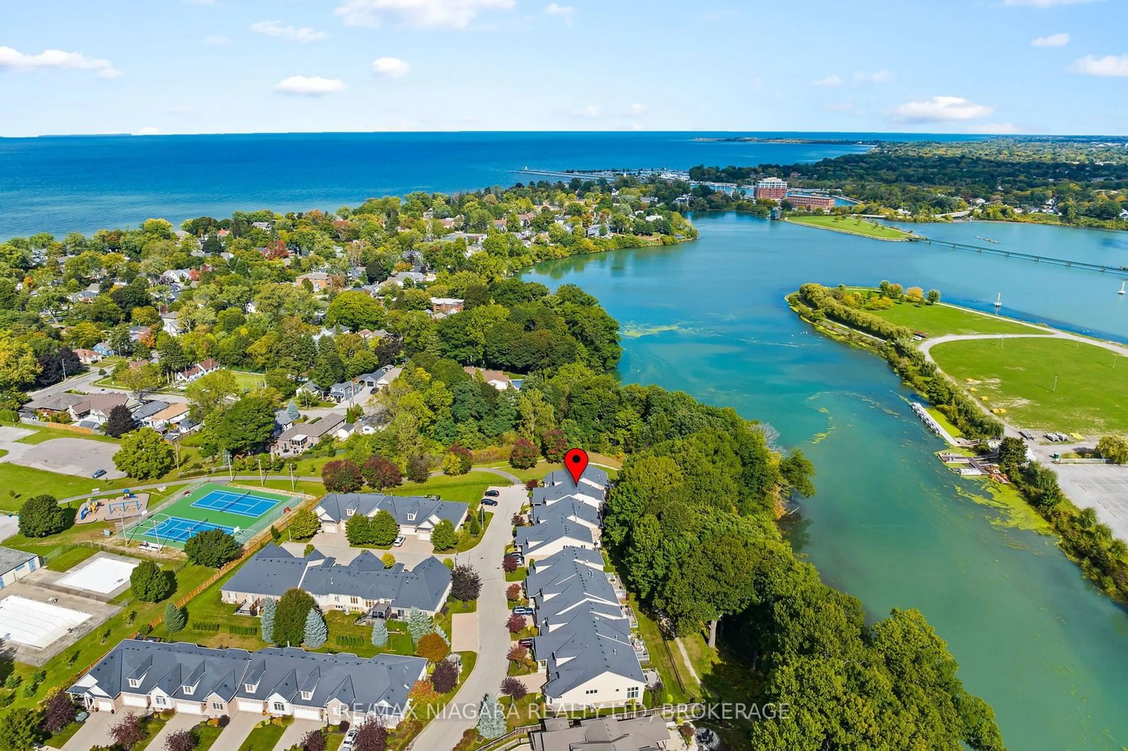 A pic from outside/outdoor area/front of a property/back of a property/a pic from drone, water/lake/river/ocean view for 35 Scullers Way #7, St. Catharines Ontario L2N 7S9