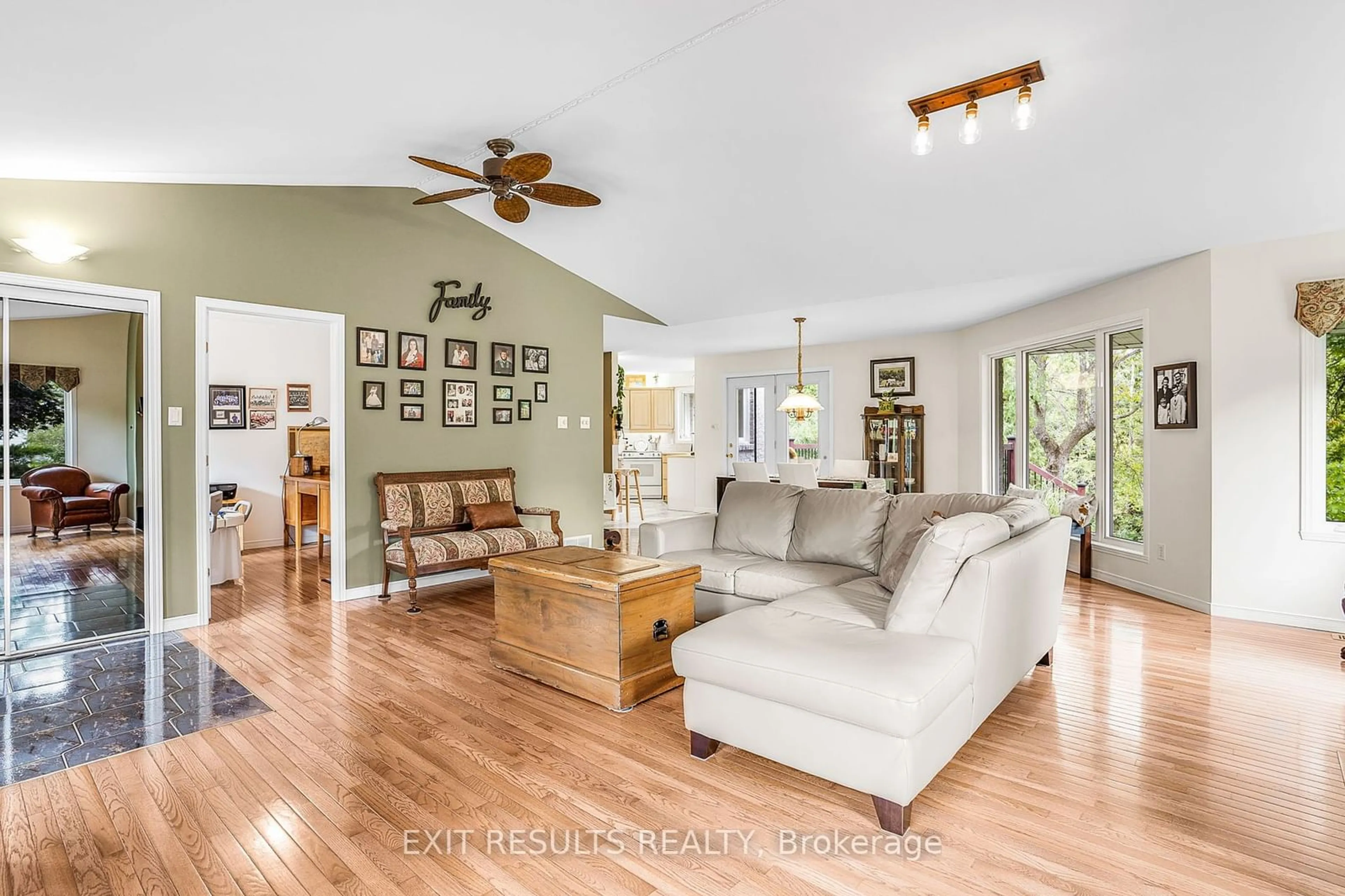 Living room with furniture, wood/laminate floor for 17568 Island Rd, South Stormont Ontario K0C 1S0