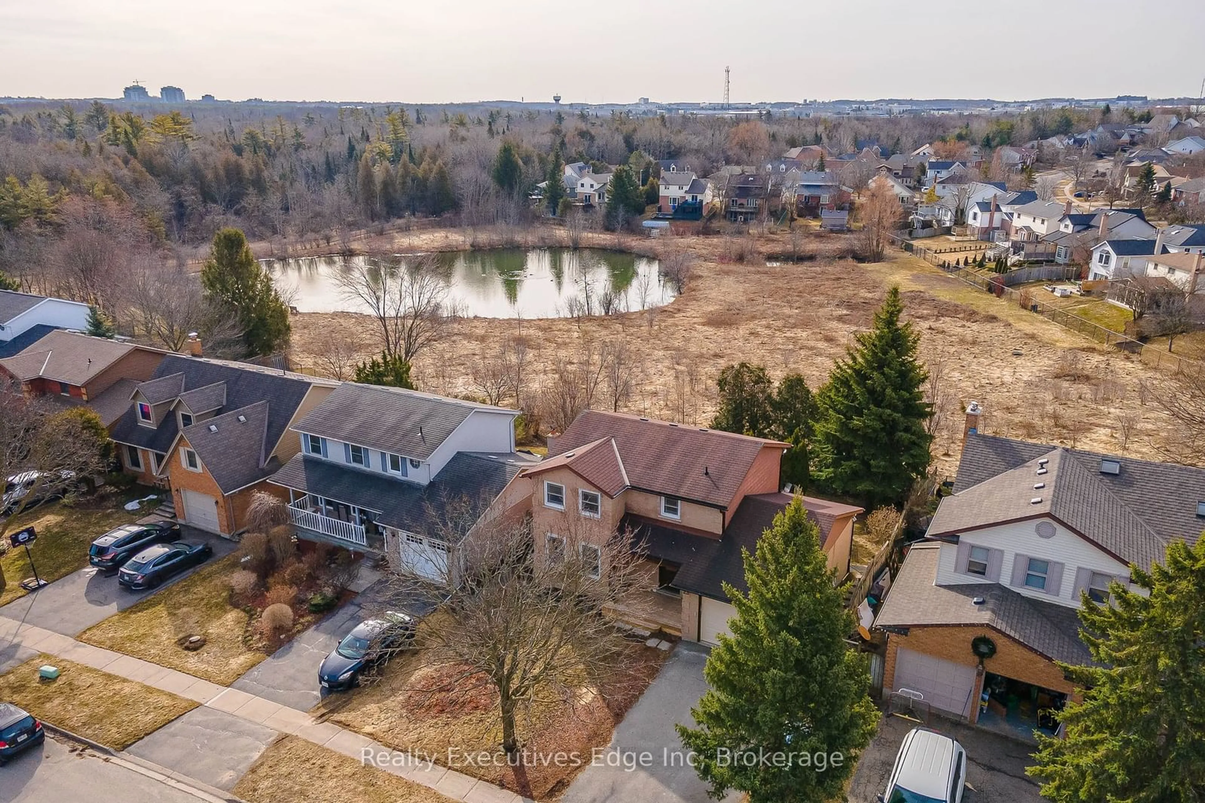 A pic from outside/outdoor area/front of a property/back of a property/a pic from drone, water/lake/river/ocean view for 23 Sagewood Pl, Guelph Ontario N1G 3M8