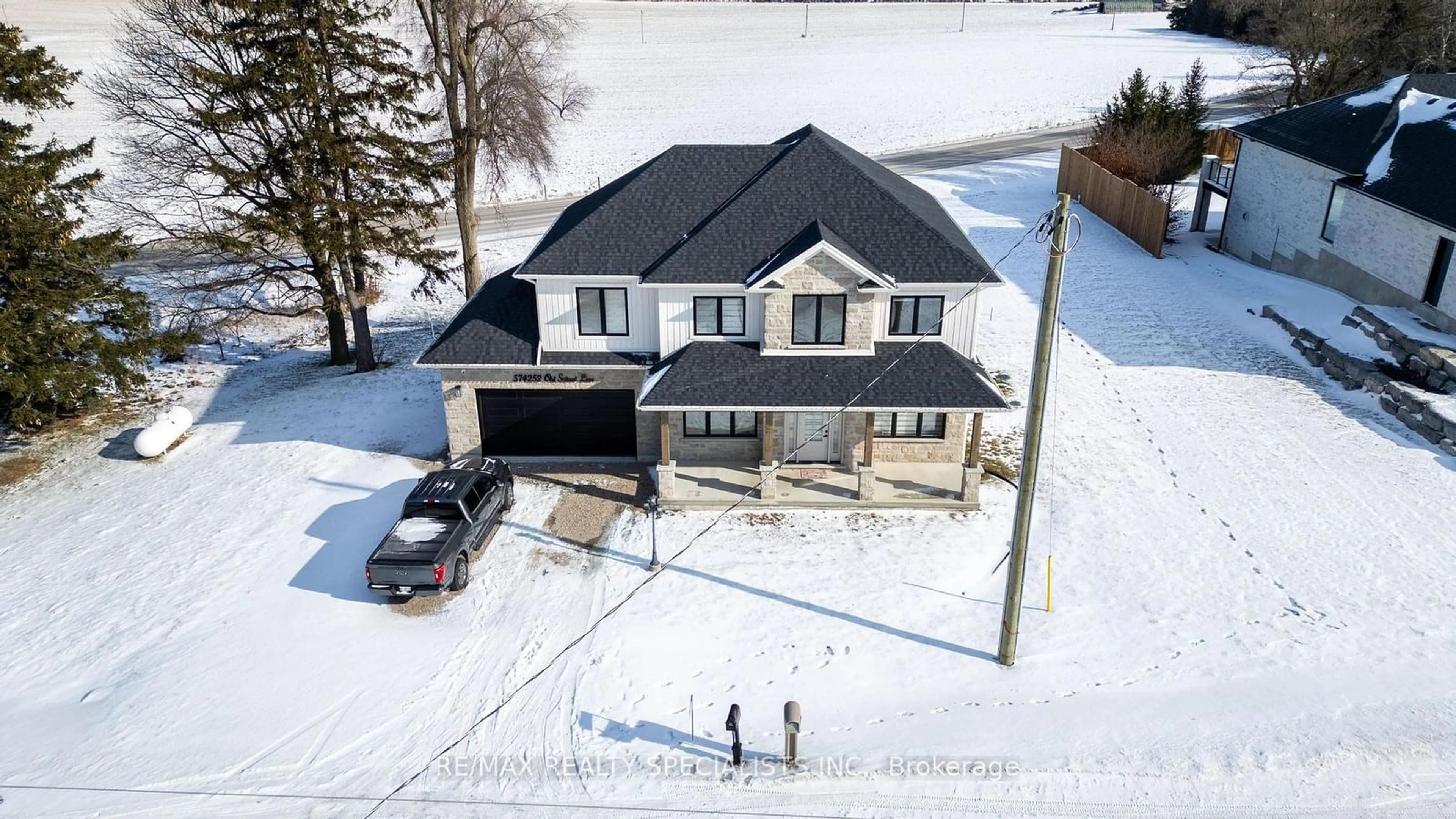 A pic from outside/outdoor area/front of a property/back of a property/a pic from drone, street for 574252 Old School Line, Woodstock Ontario N4S 7V8