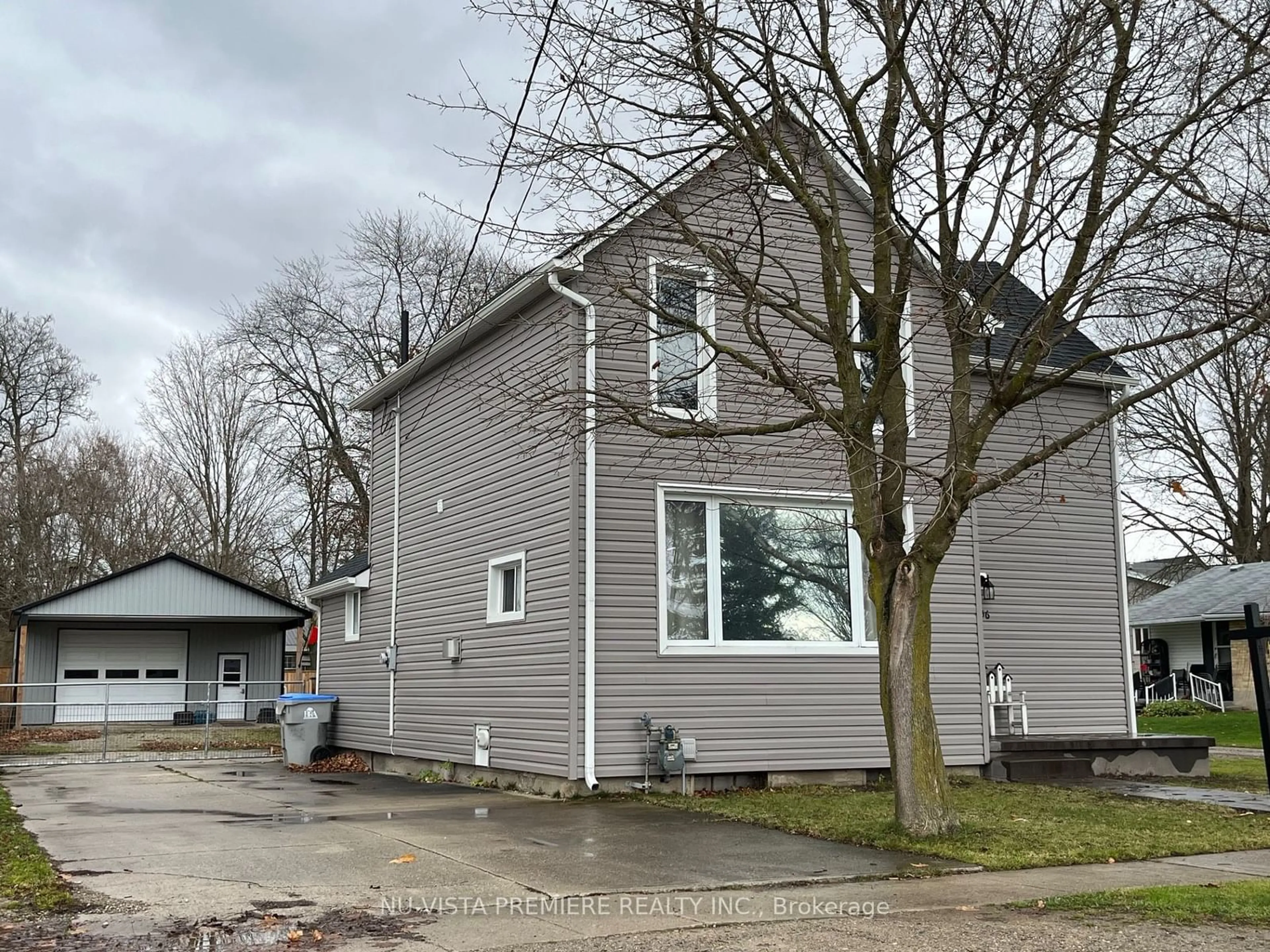 Home with vinyl exterior material, street for 256 Pearl St, North Middlesex Ontario N0M 2K0