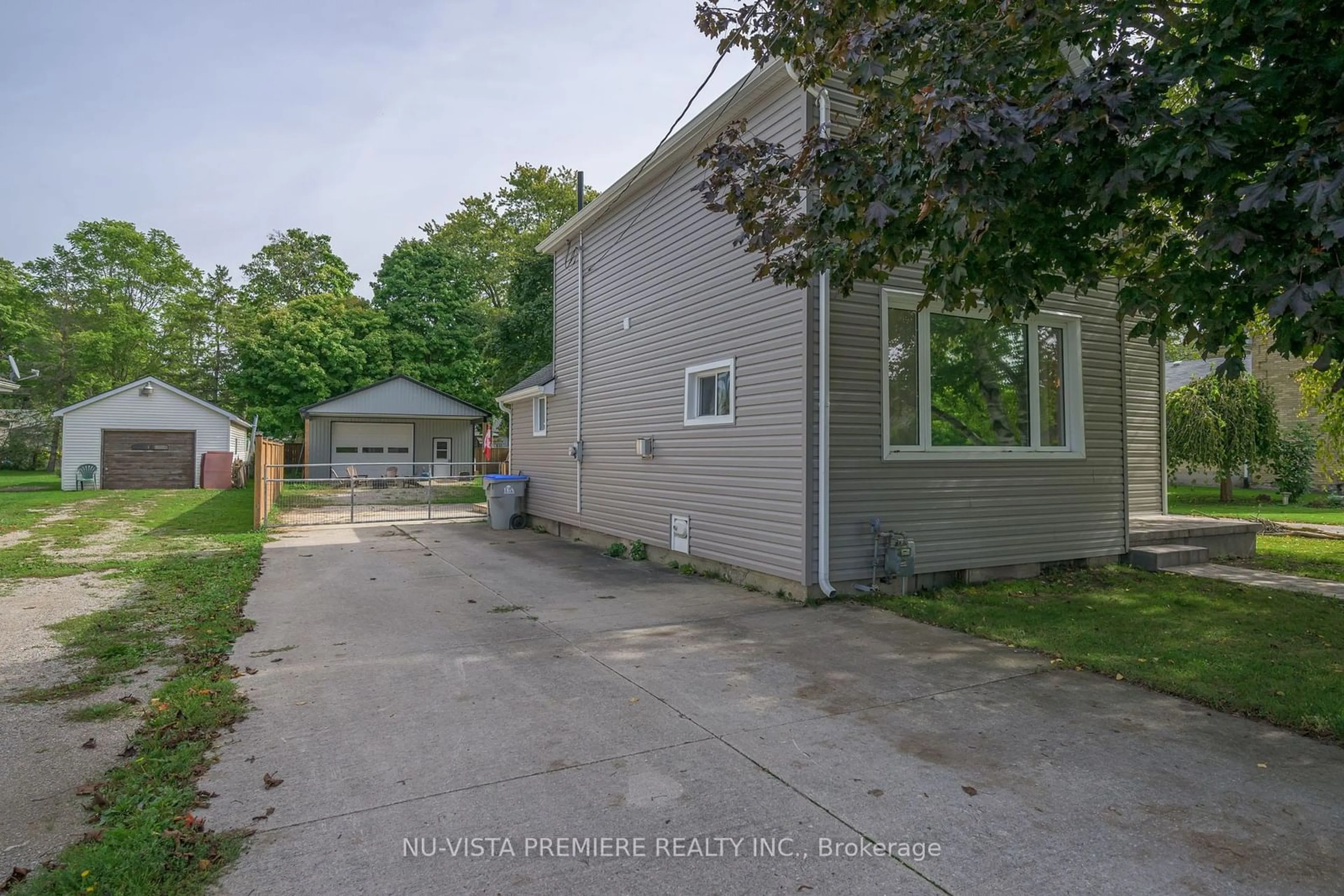 A pic from outside/outdoor area/front of a property/back of a property/a pic from drone, street for 256 Pearl St, North Middlesex Ontario N0M 2K0