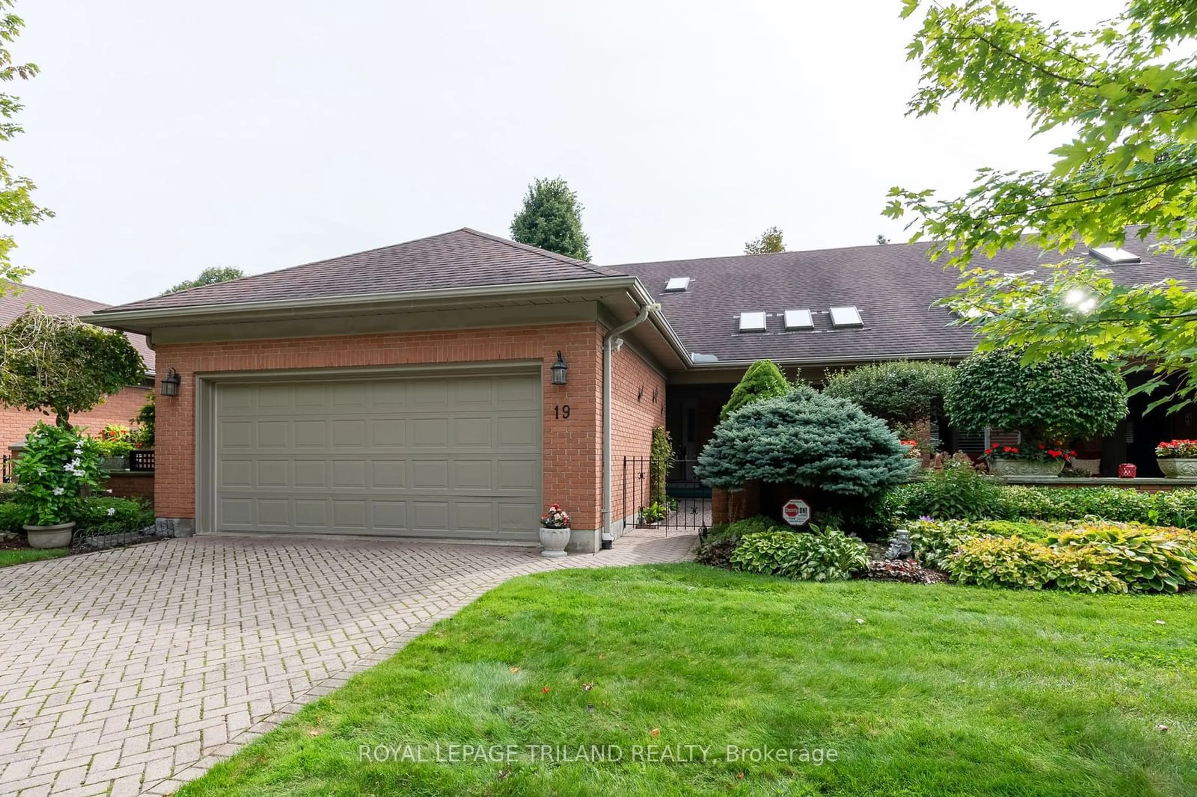 Home with brick exterior material, street for 40 Quinella Dr #19, London Ontario N6K 4K9