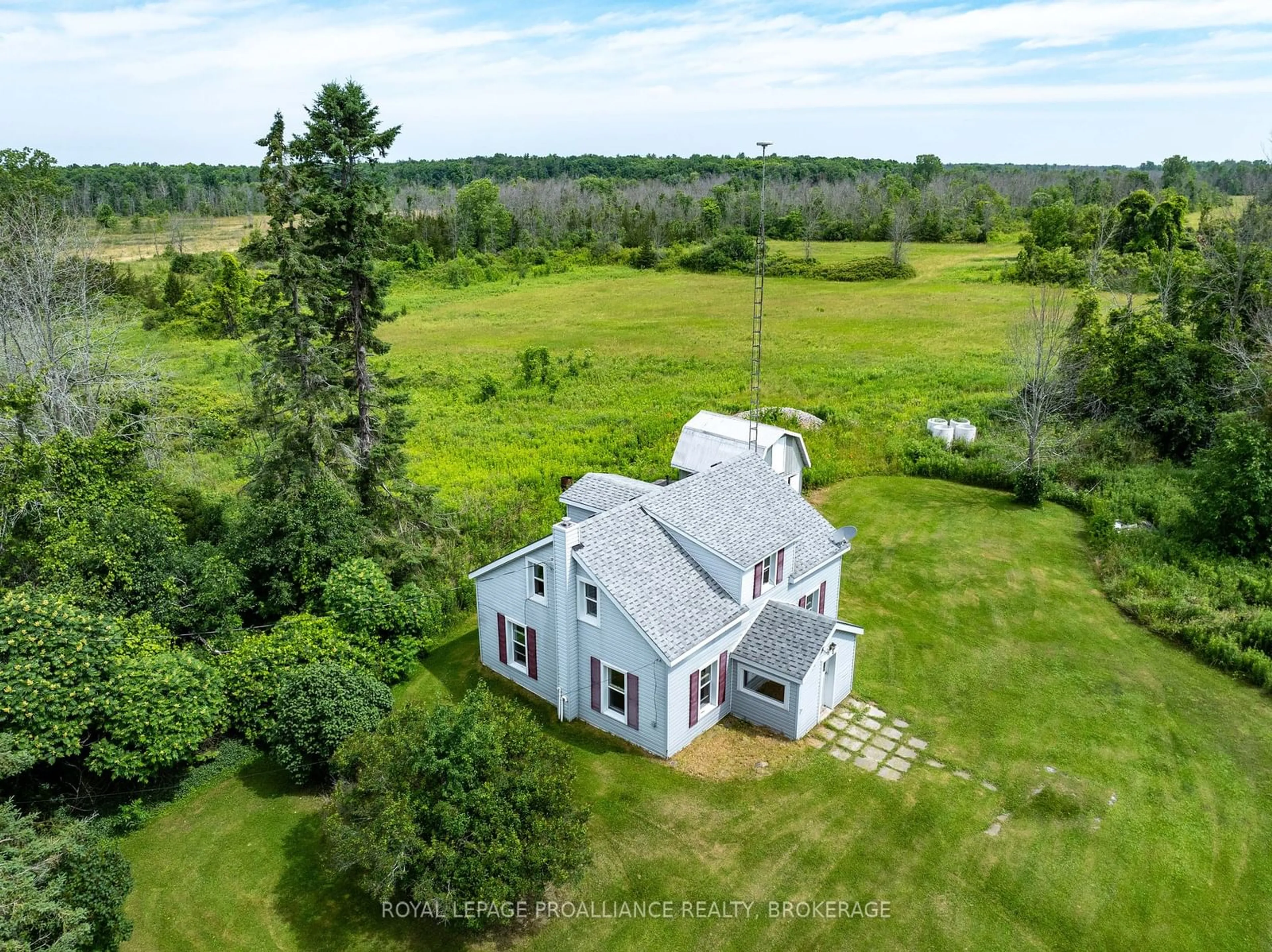 A pic from outside/outdoor area/front of a property/back of a property/a pic from drone, unknown for 661 County Rd 25, Greater Napanee Ontario K7R 3K7