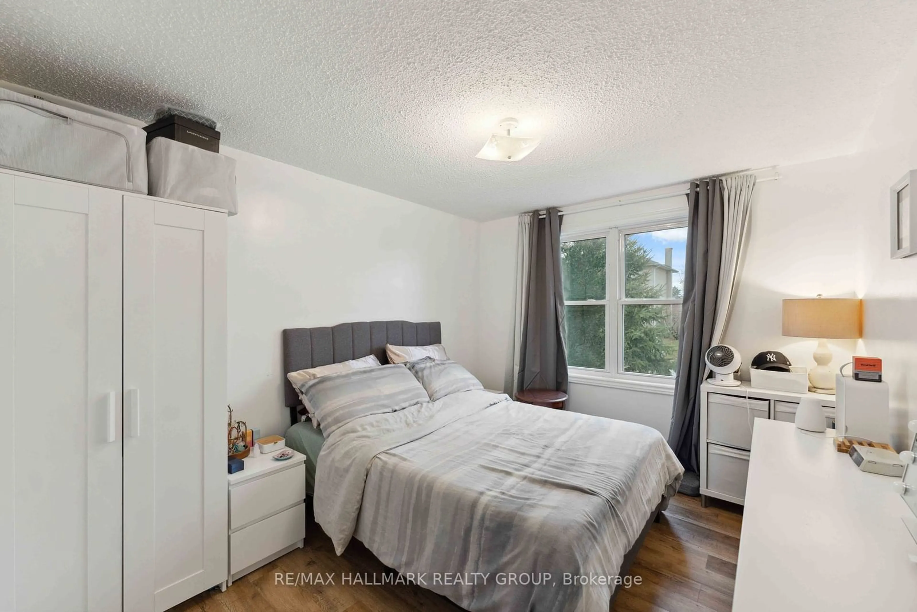 Bedroom with bed, wood/laminate floor for 2427 Chasseur Ave, Billings Bridge - Riverside Park and Area Ontario K1V 8E5