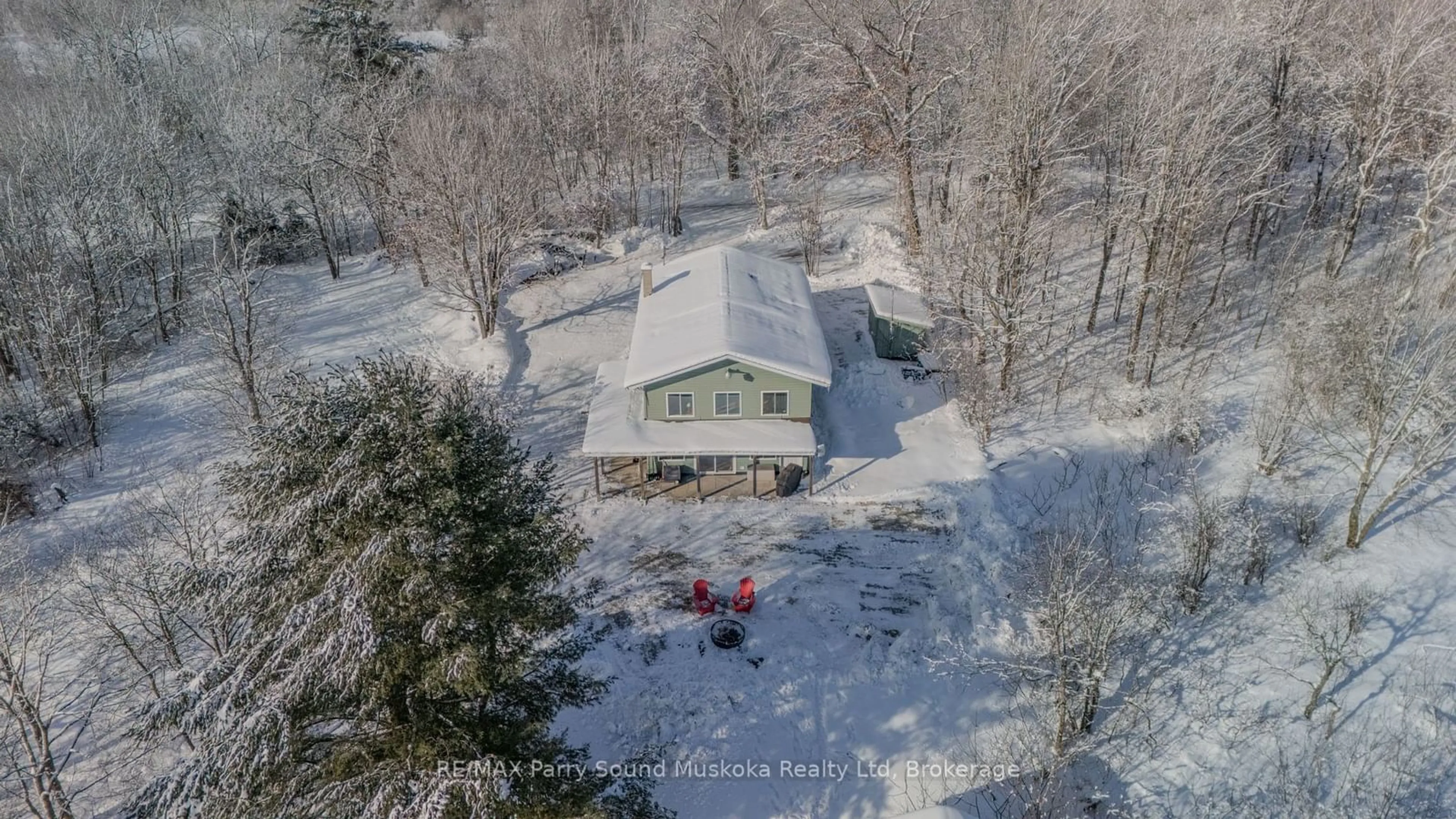 A pic from outside/outdoor area/front of a property/back of a property/a pic from drone, street for 51 Hardies Rd, McKellar Ontario P2A 0B5