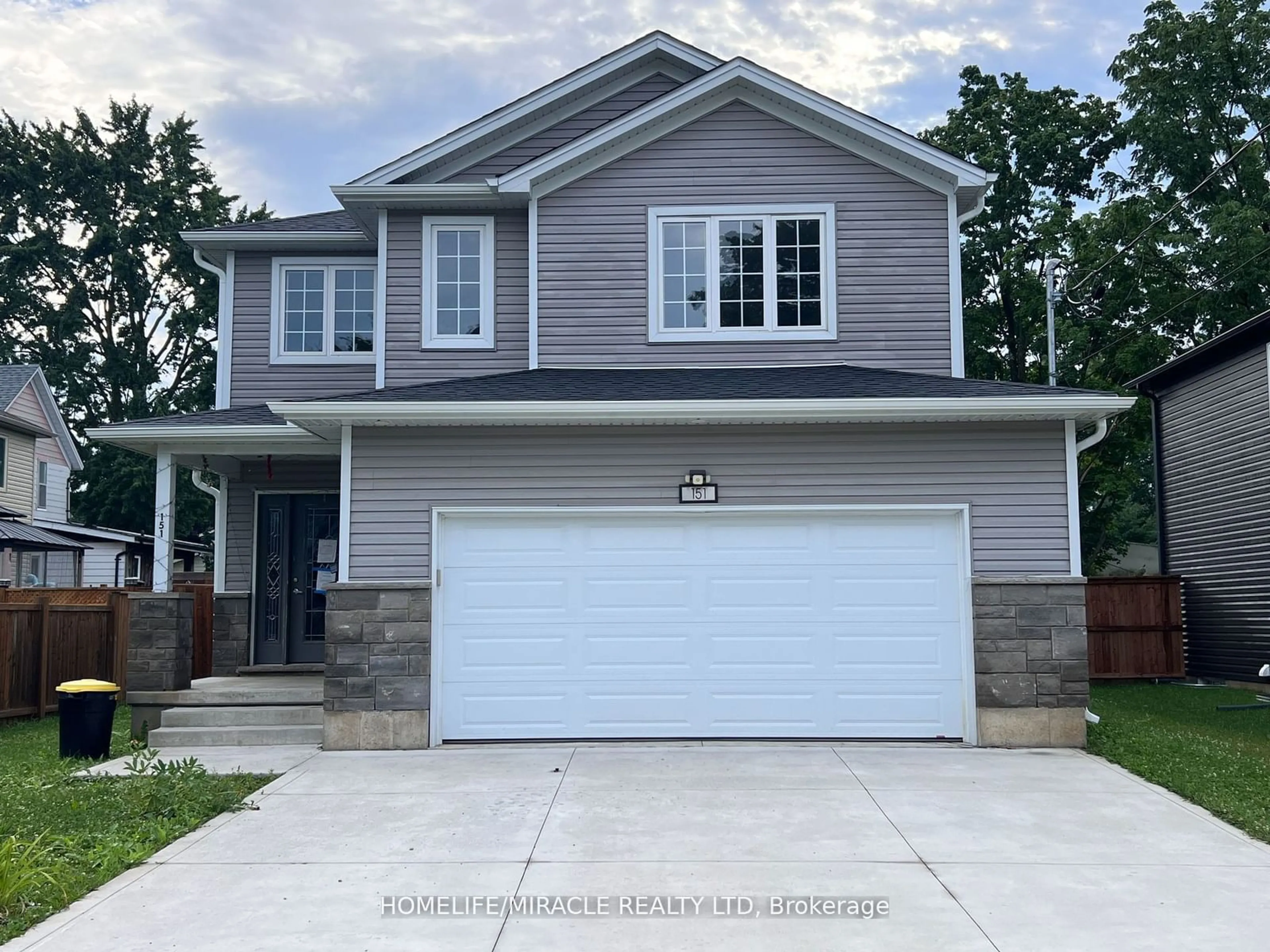 Home with vinyl exterior material, street for 151 Agnes St, Thames Centre Ontario N0M 2P0