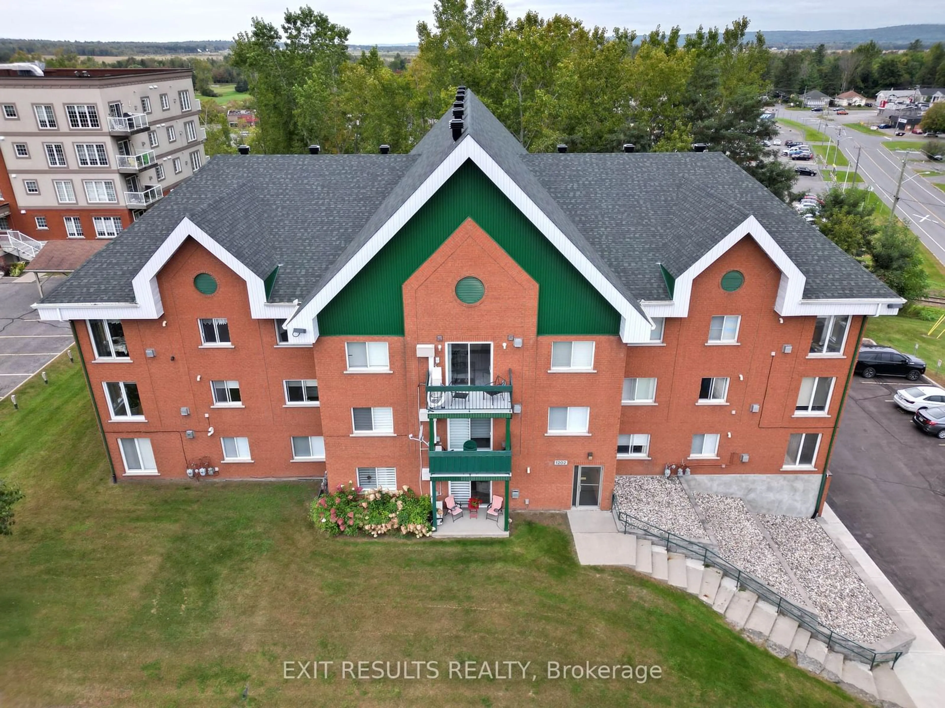 A pic from outside/outdoor area/front of a property/back of a property/a pic from drone, building for 1202 Clement St #236, Hawkesbury Ontario K6A 3V6