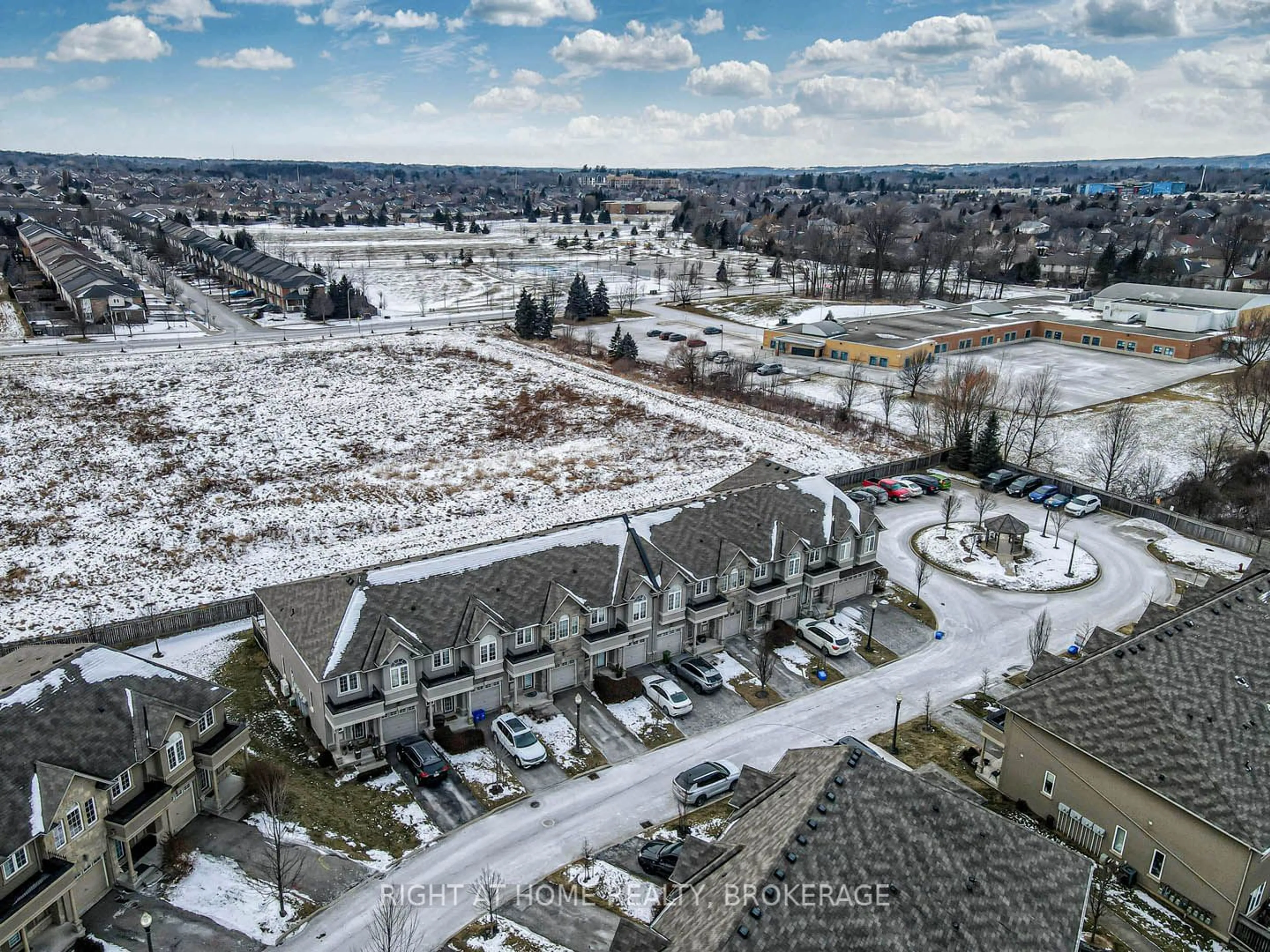 A pic from outside/outdoor area/front of a property/back of a property/a pic from drone, street for 370 Stonehenge Dr #9, Hamilton Ontario L9K 0H9