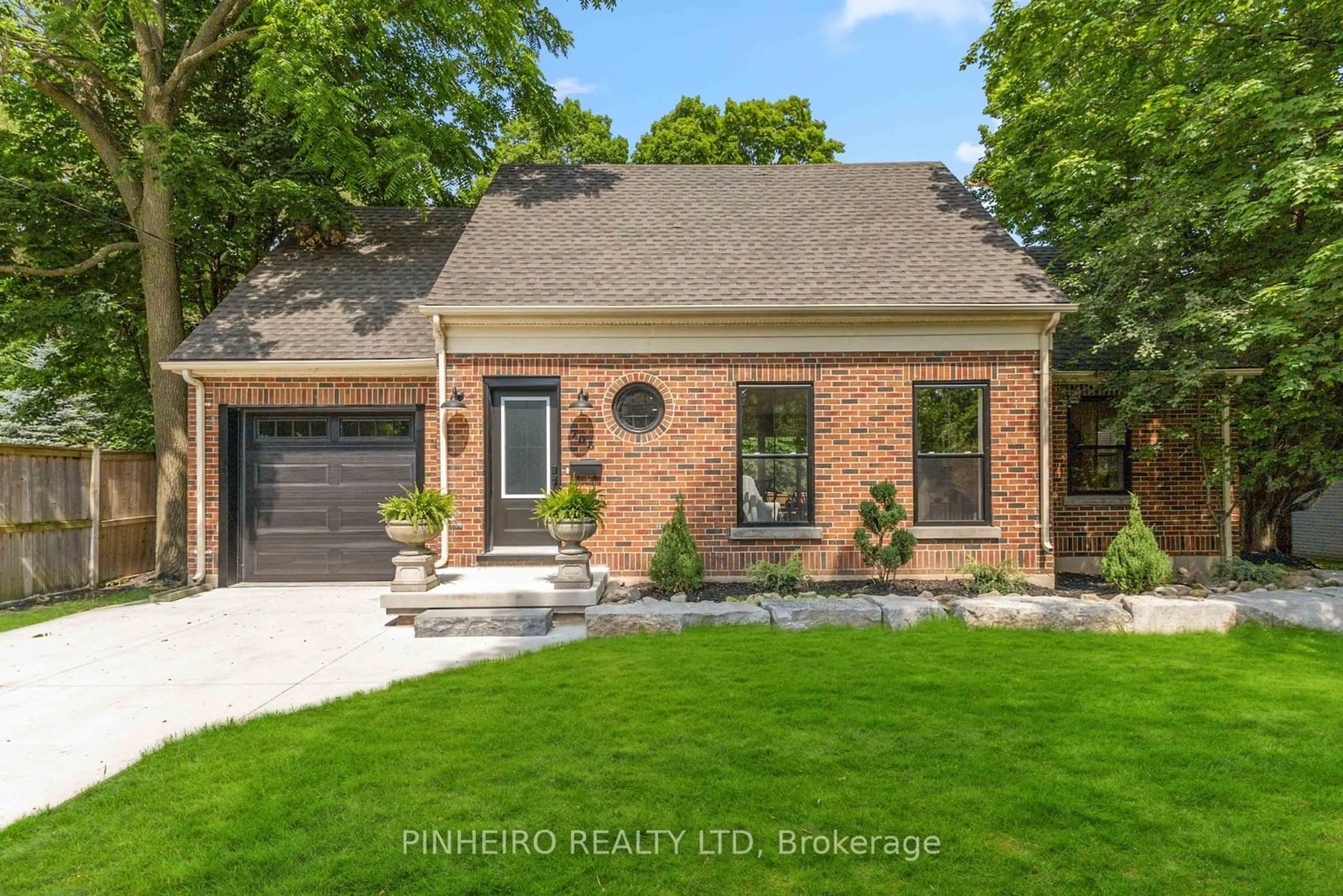 Home with brick exterior material, street for 703 Riverside Dr, London Ontario N6H 2S5