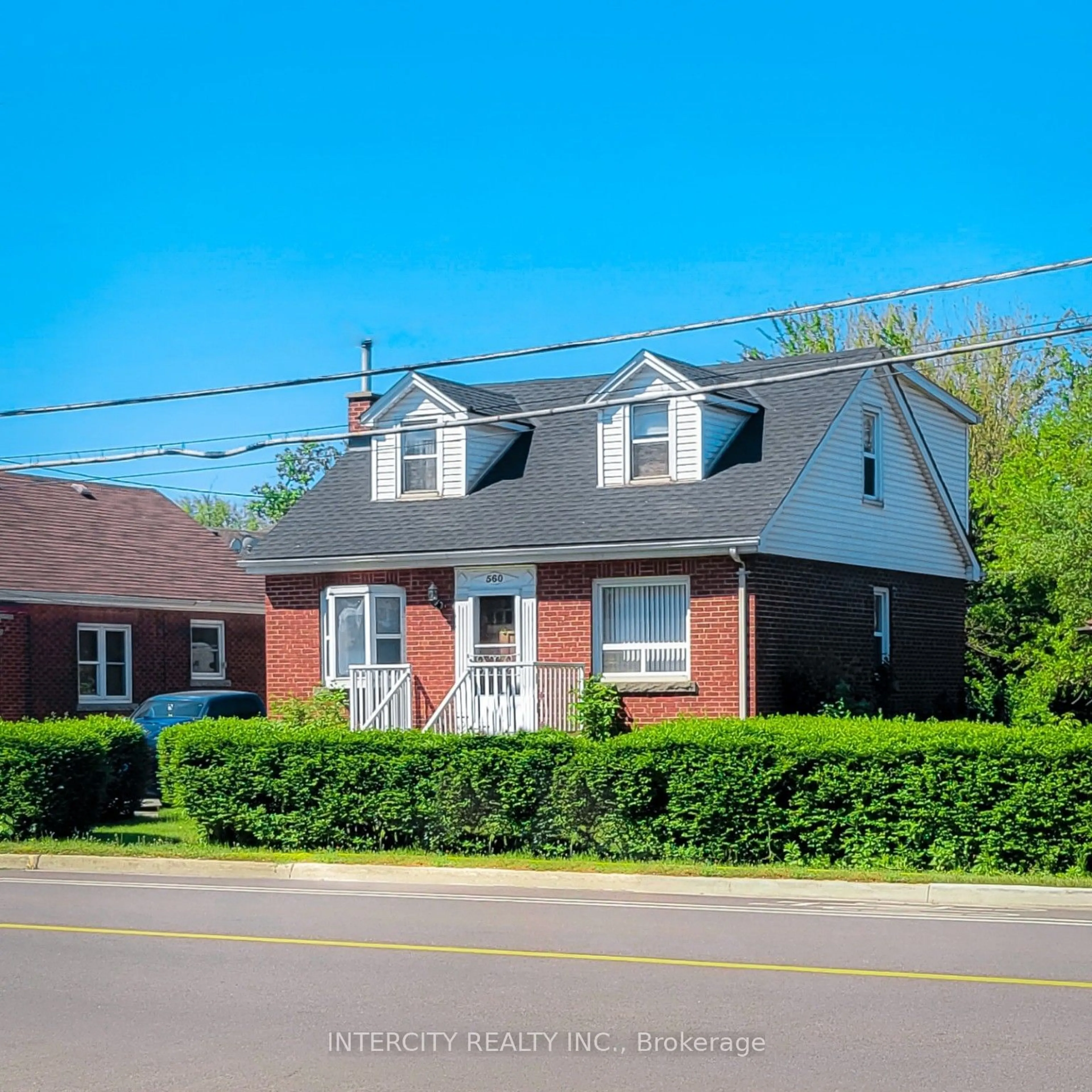 Home with brick exterior material, street for 560 Beach Blvd, Hamilton Ontario L8H 6X6