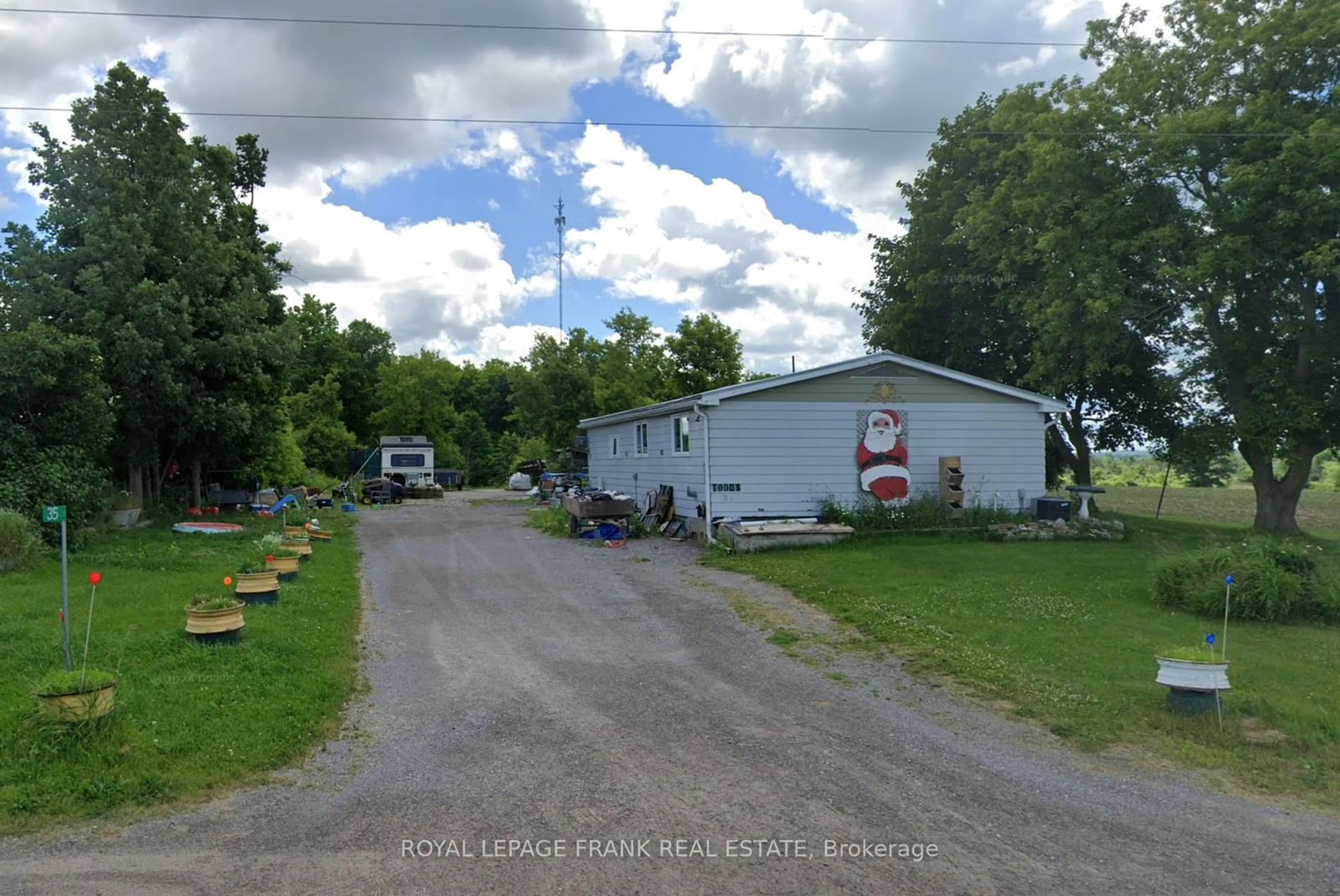 A pic from outside/outdoor area/front of a property/back of a property/a pic from drone, street for 35 5th Line, Otonabee-South Monaghan Ontario K0L 1V0