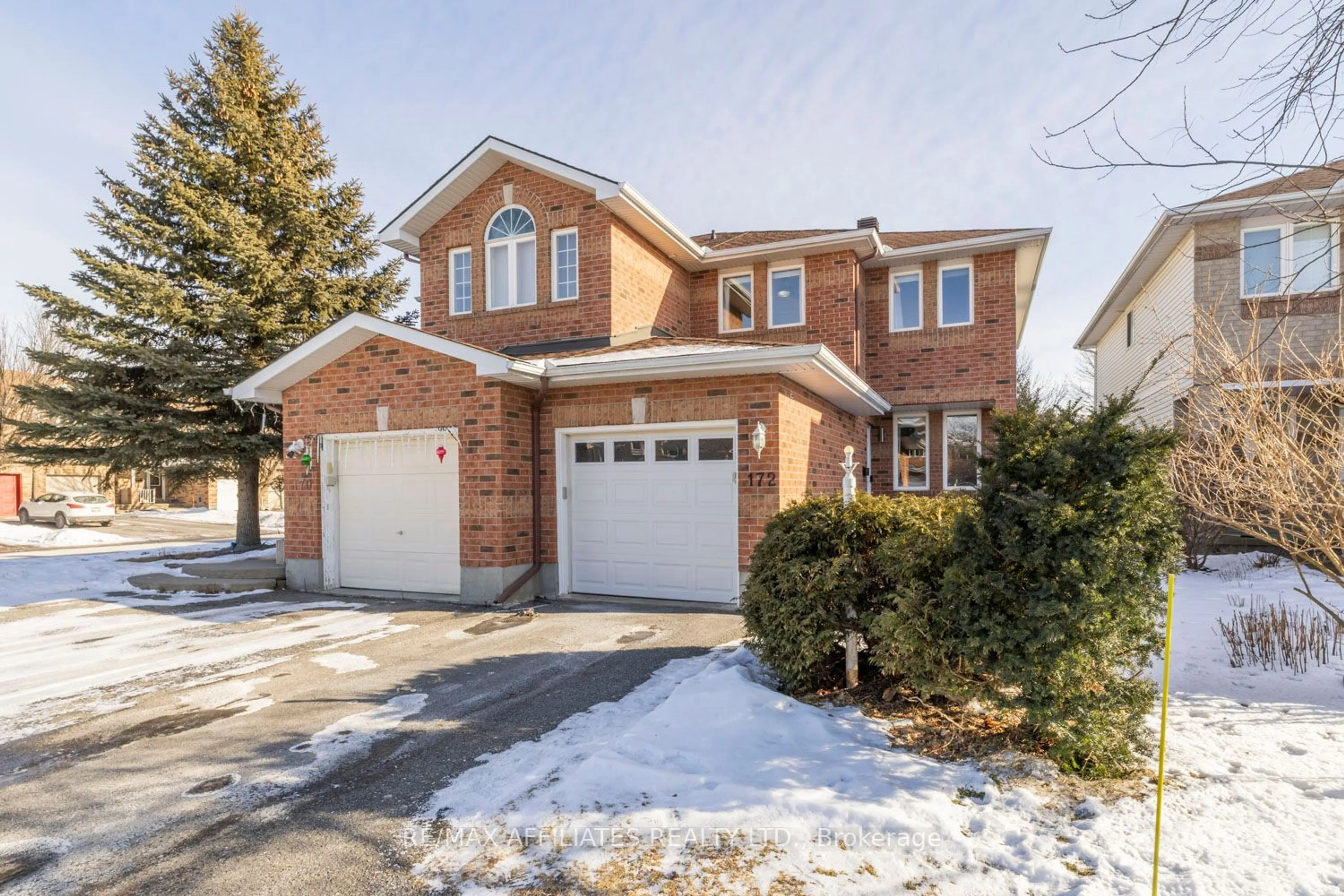 Home with brick exterior material, street for 172 Mountshannon Dr, Barrhaven Ontario K2J 4M9