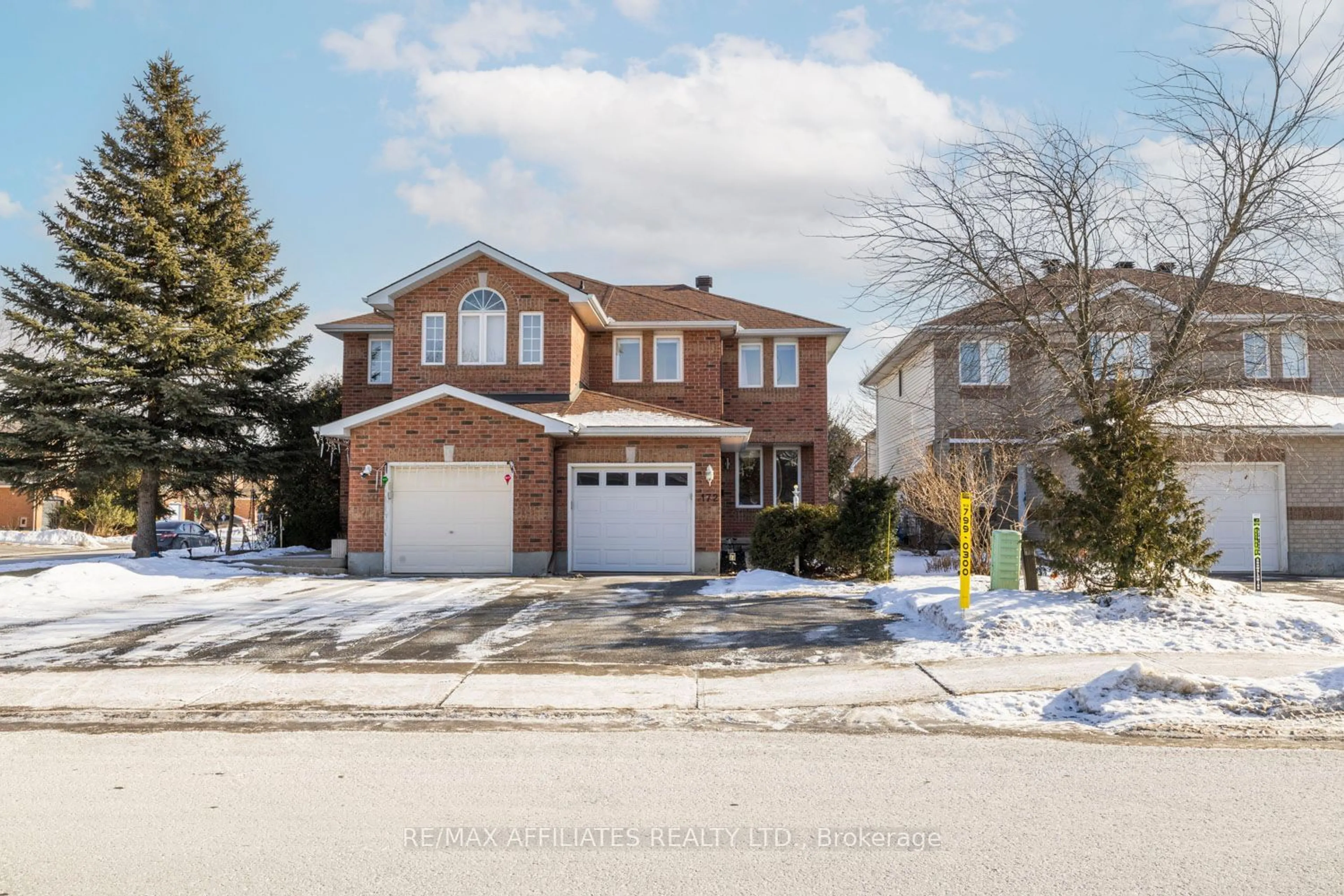 Home with brick exterior material, street for 172 Mountshannon Dr, Barrhaven Ontario K2J 4M9