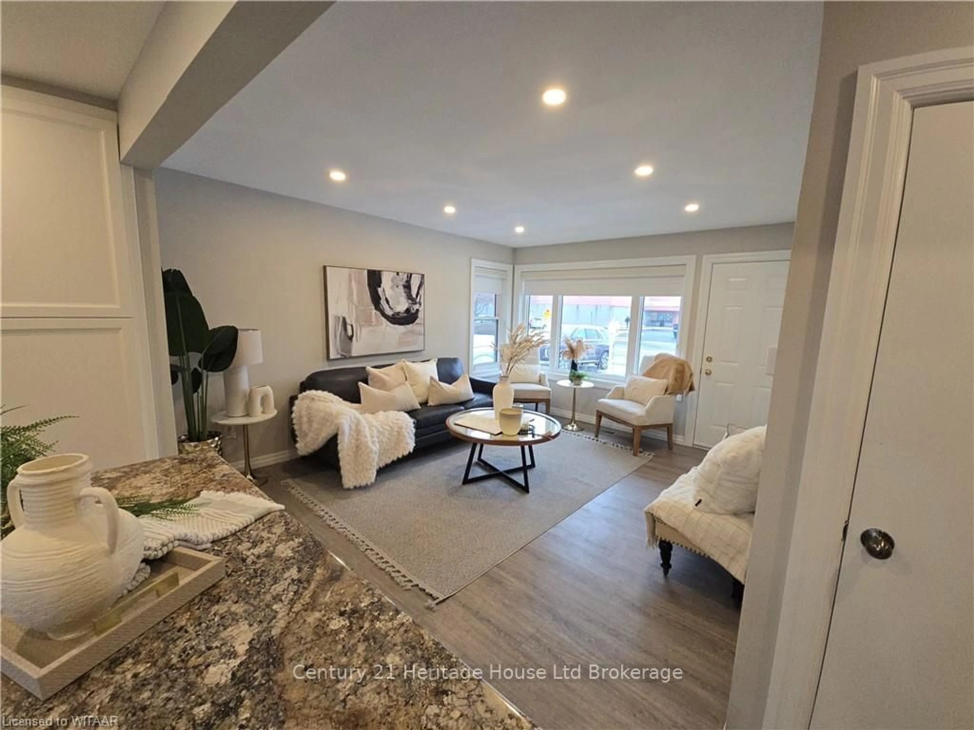 Living room with furniture, ceramic/tile floor for 980 DEVONSHIRE Ave, Woodstock Ontario N4S 5S2