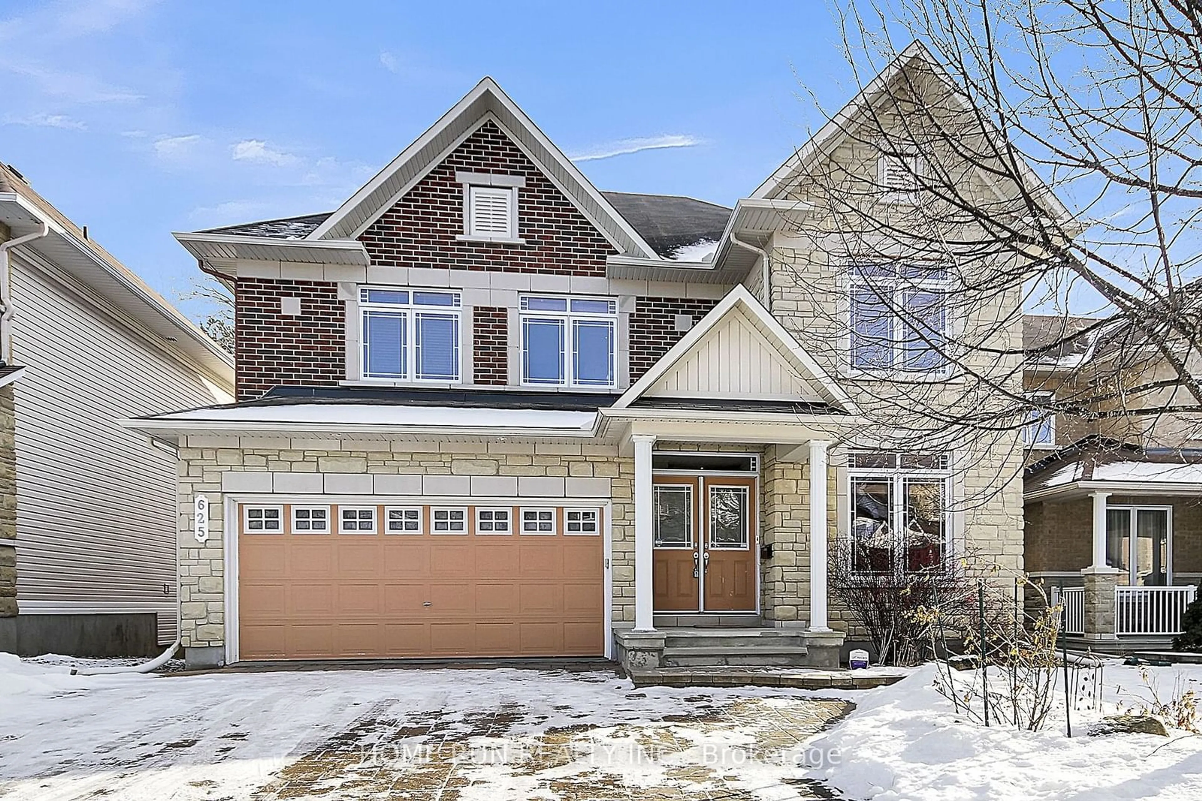 Home with brick exterior material, street for 625 New Liskeard Cres, Barrhaven Ontario K2J 0N4