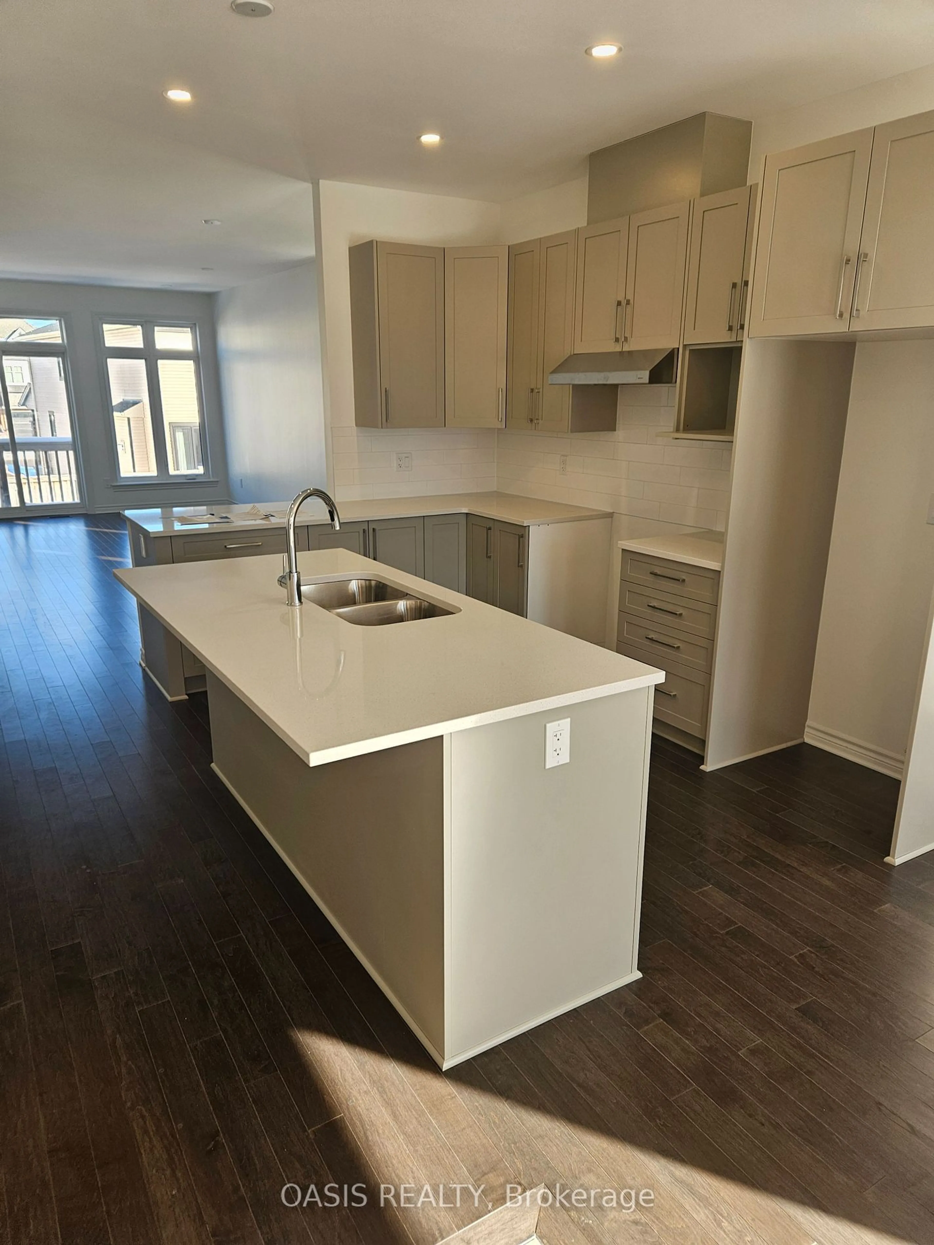 Open concept kitchen, wood/laminate floor for 54 Kayenta St, Stittsville - Munster - Richmond Ontario K2S 2K7